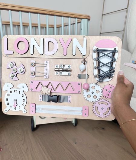 One of Londyns toys from her first birthday.. a personalized busy board! Found it on Etsy. 

Toddler gifts, personalized toddler gifts, baby’s first birthday gift, first birthday gift, newborn gift 

#LTKkids #LTKbaby