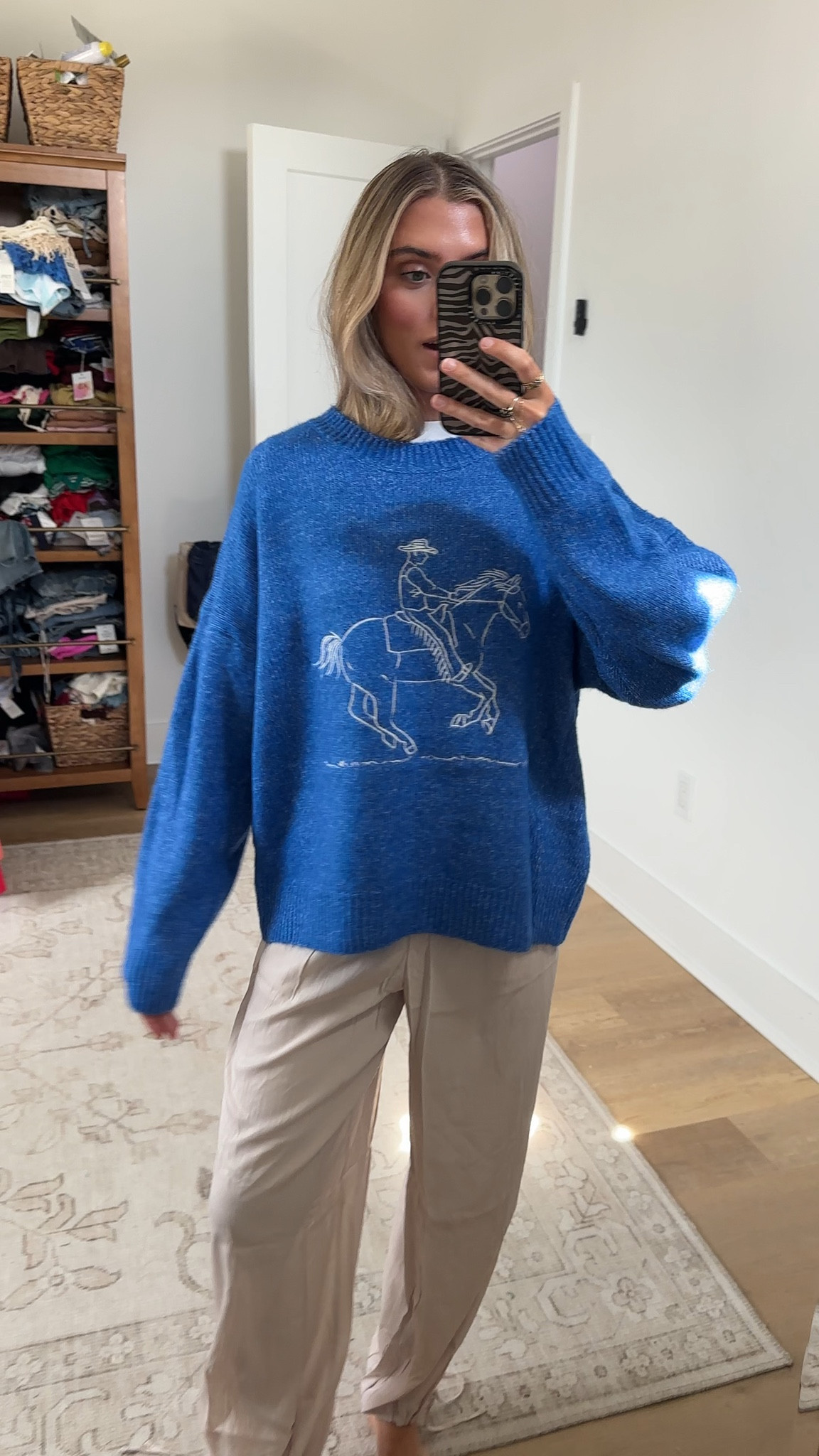 @lashnextdoor size medium I did size up for oversized fit this is the rodeo night sweater

#LTKootd #LTKSeasonal #LTKdayinmylife