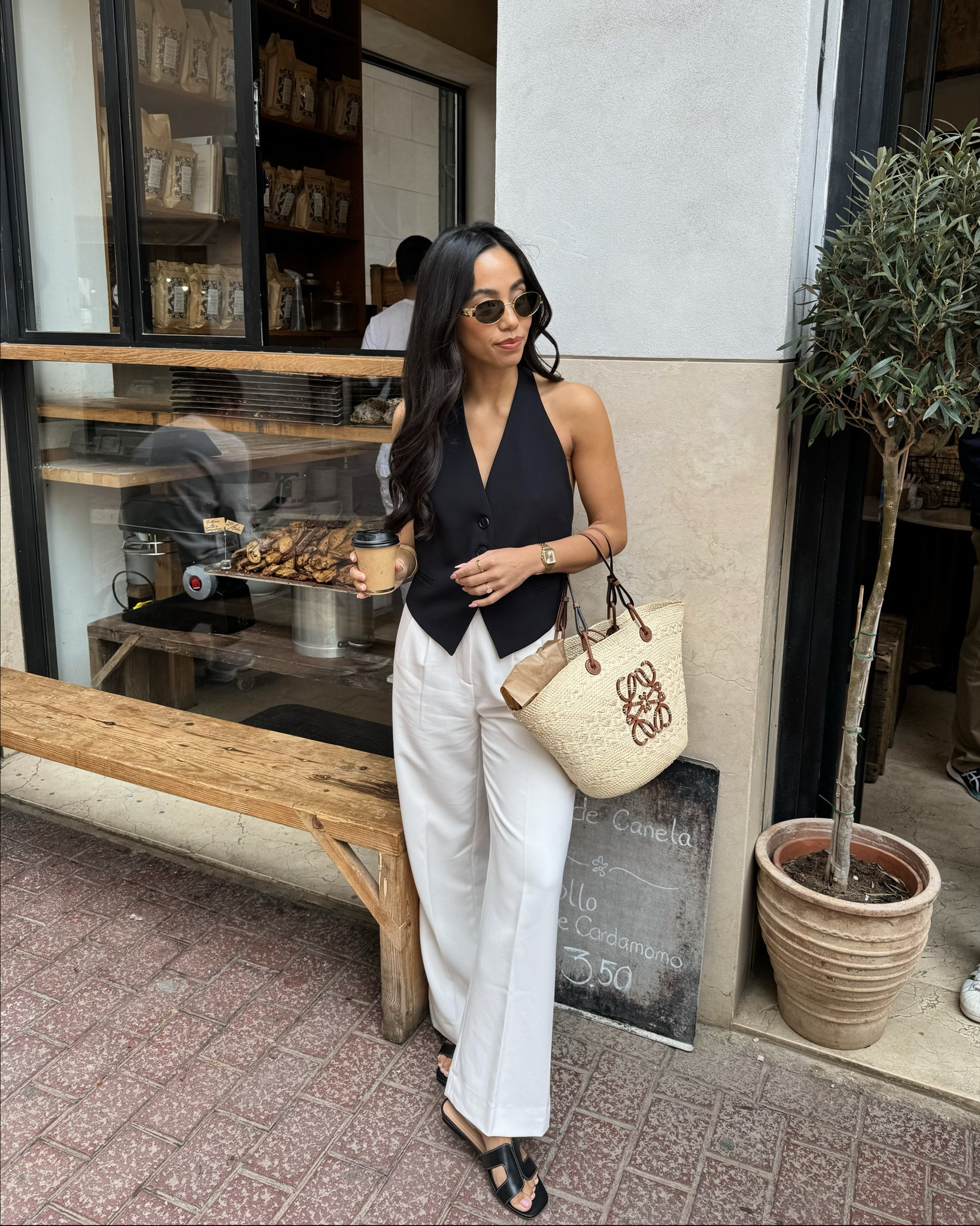Spring summer outfits 🤍 perfect for a city break, white tailored trousers and a black waistcoat styled with my Dune sandals 

#LTKspring #LTKsummer #LTKeurope