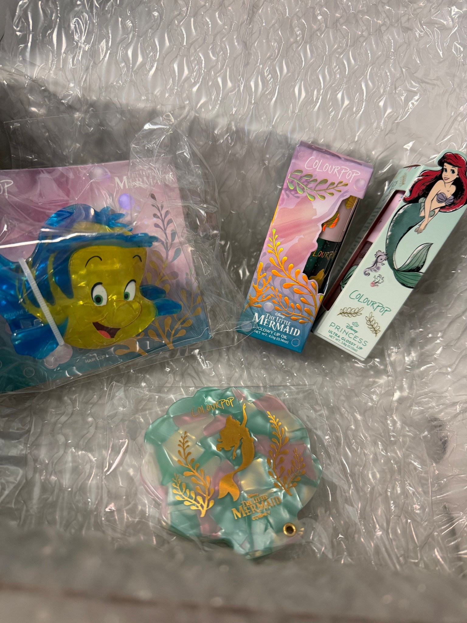 The Little Mermaid collab with Colour Pop has arrived. Here are my picks from the collab!

The Little Mermaid Flounder claw hair clip. 
The Little Mermaid shell mirror. 
The Little Mermaid Glowy Lip Oil. 
Disney Princess Collab - The Little Mermaid - Ultra Glossy Lip

I can’t WAIT to bring these on my upcoming mini honeymoon vacation to St. Augustine  

#LTKselfcare #LTKgrwm #LTKdayinmylife