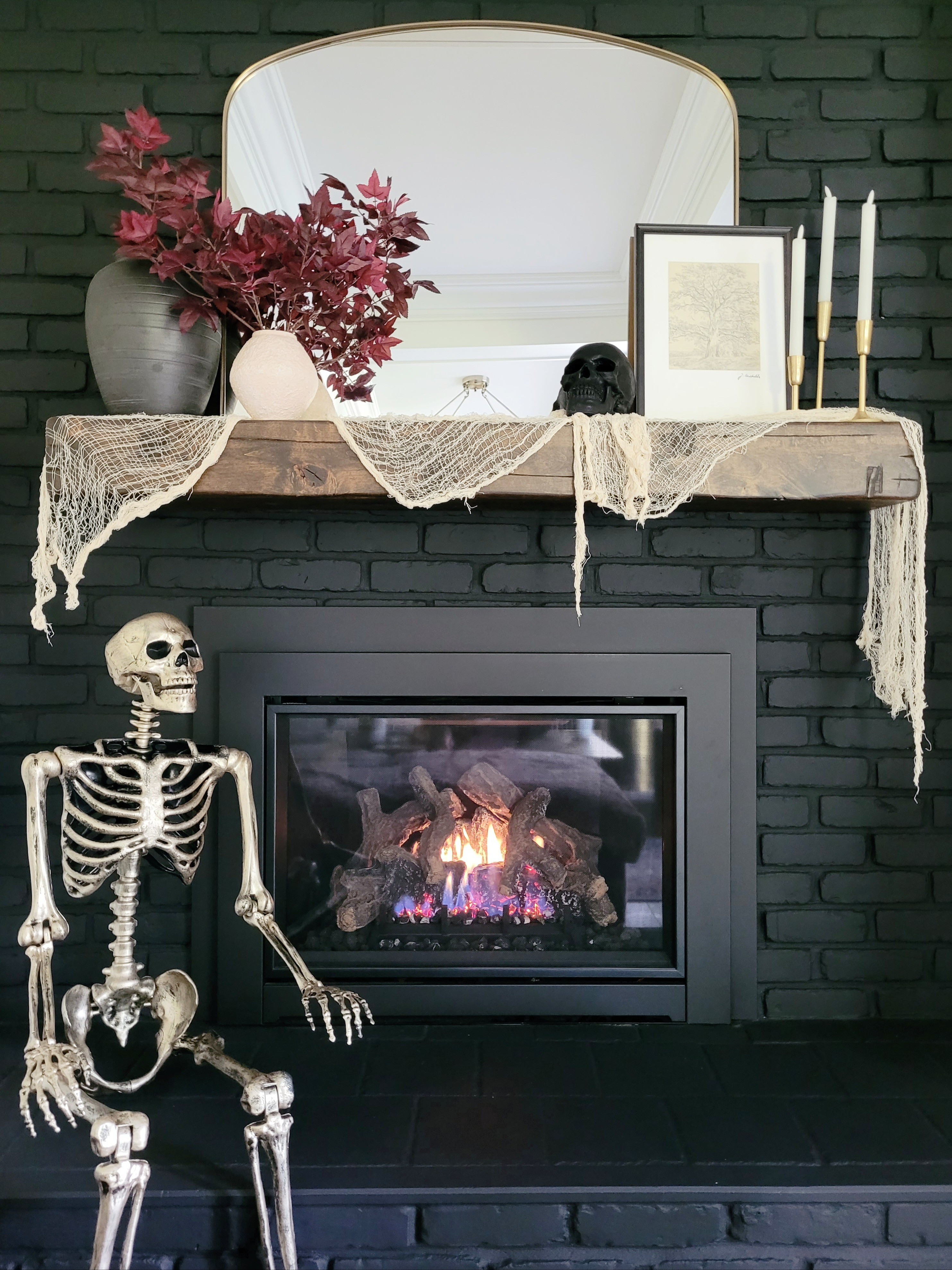 I loved decorating our black fireplace for Halloween this year! Spooky Halloween mantle,  skeleton,  Halloween decor,  living room,  shelf styling

#LTKHalloween #LTKHome #LTKFindsUnder50