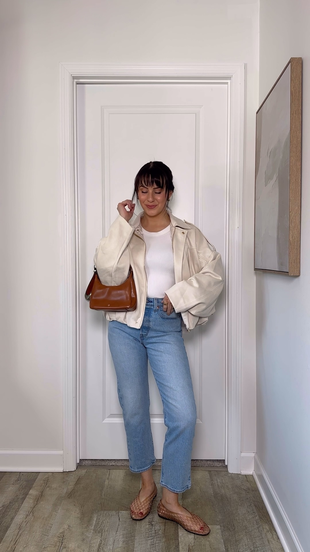 Easy spring outfit formula = white tank top + slim straight jeans + a light jacket + jellies 👏🏼 

my tank top I have in grey too and have had for 4 years! Aerie find and it’s on sale. Jeans come in lengths I’m wearing 26” in size 27 here - TTS

#LTKSeasonal #LTKSaleAlert #LTKPetite