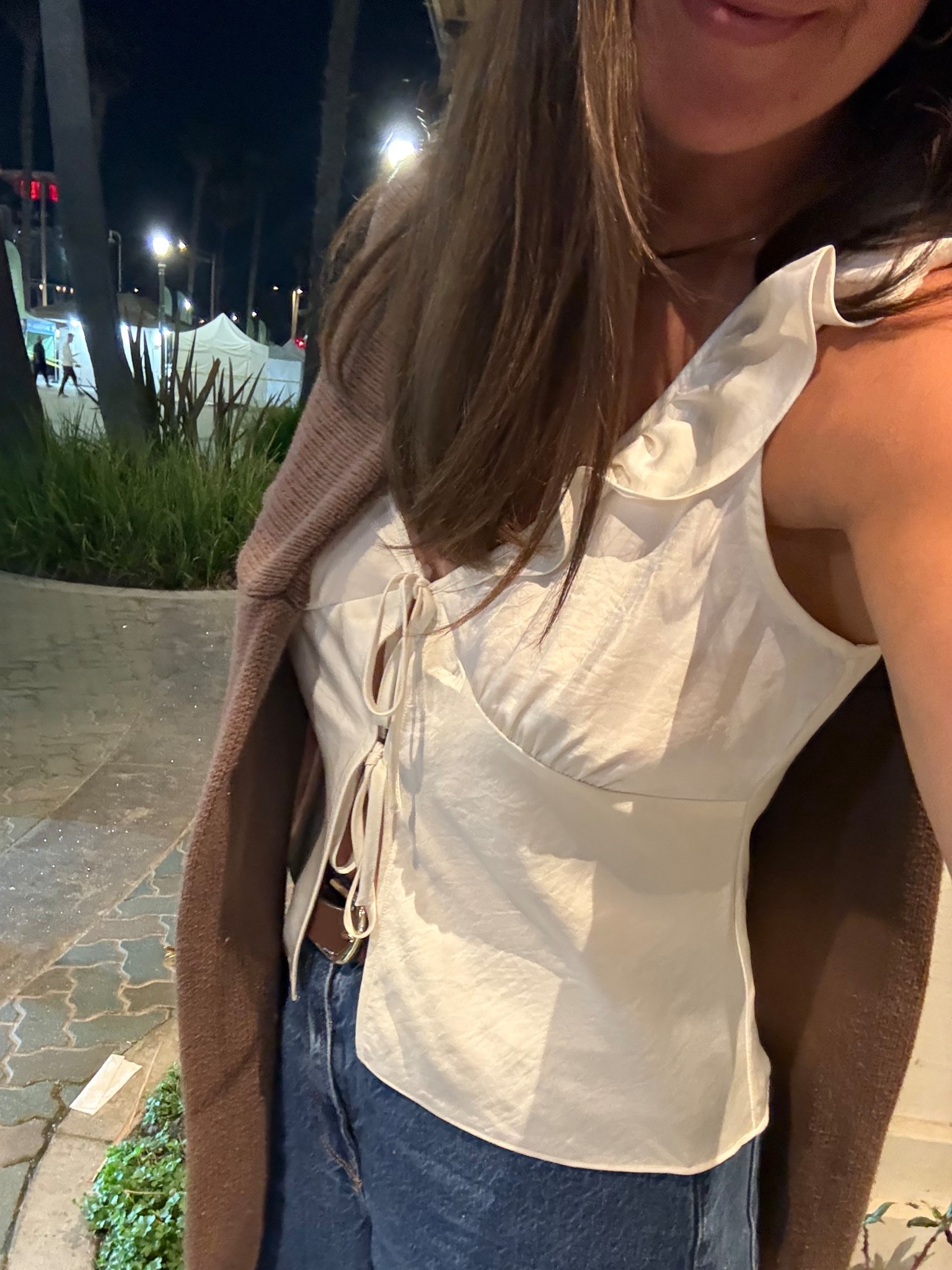 Silk top paired with jeans and kitten heels 
@Aritzia doesn’t make this exact top anymore but linked a couple similar options!! 

#LTKTravel #LTKootd #LTKgrwm