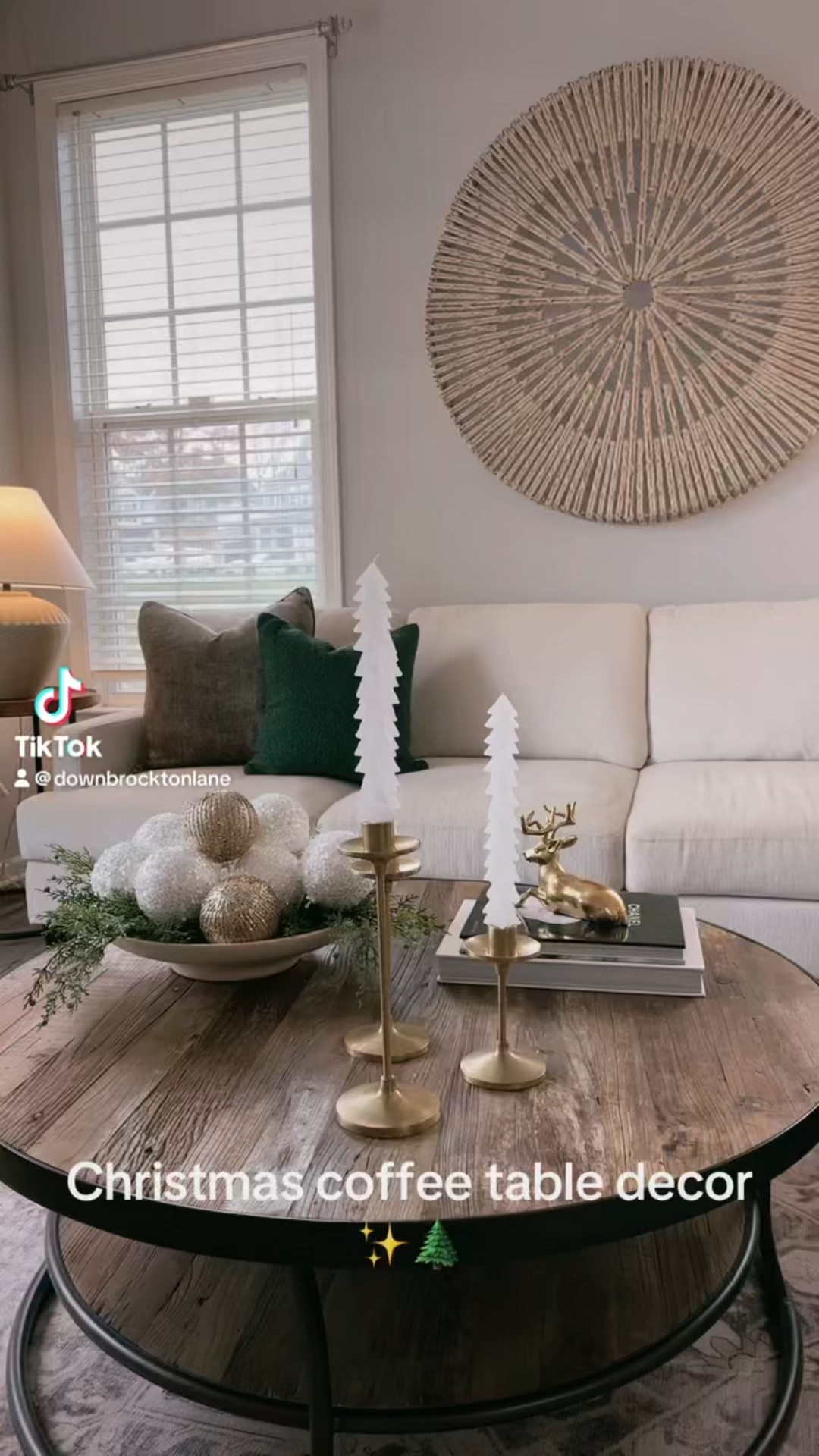 Cozy Christmas Coffee Table Styling ✨
I kept it simple with sparkling ornaments, tree taper candles in brushed gold holders, along with a touch of charm reindeer accent on stacked coffee table books for balance.  Brining just the right amount of festive sparkle without feeling cluttered  
#LTKChristmasCoffeeTableDecor #LTKCoffeeTableStyling #LTKHolidayTableDecor #LTKHolidayStyling #LTKChristmasLivingRoom #LTKElegantChristmasDecor #LTKCozyChristmasVibes #LTKModernChristmas

#LTKStyleTip #LTKHome #LTKSeasonal