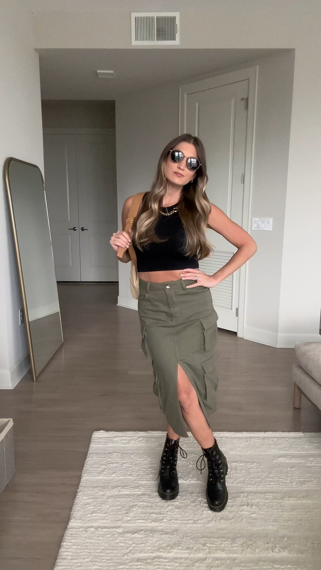 Fall outfit! Crop top, cargo skirt, combat boots. Wearing S top, XS skirt

#LTKfindsunder100 #LTKSeasonal #LTKstyletip