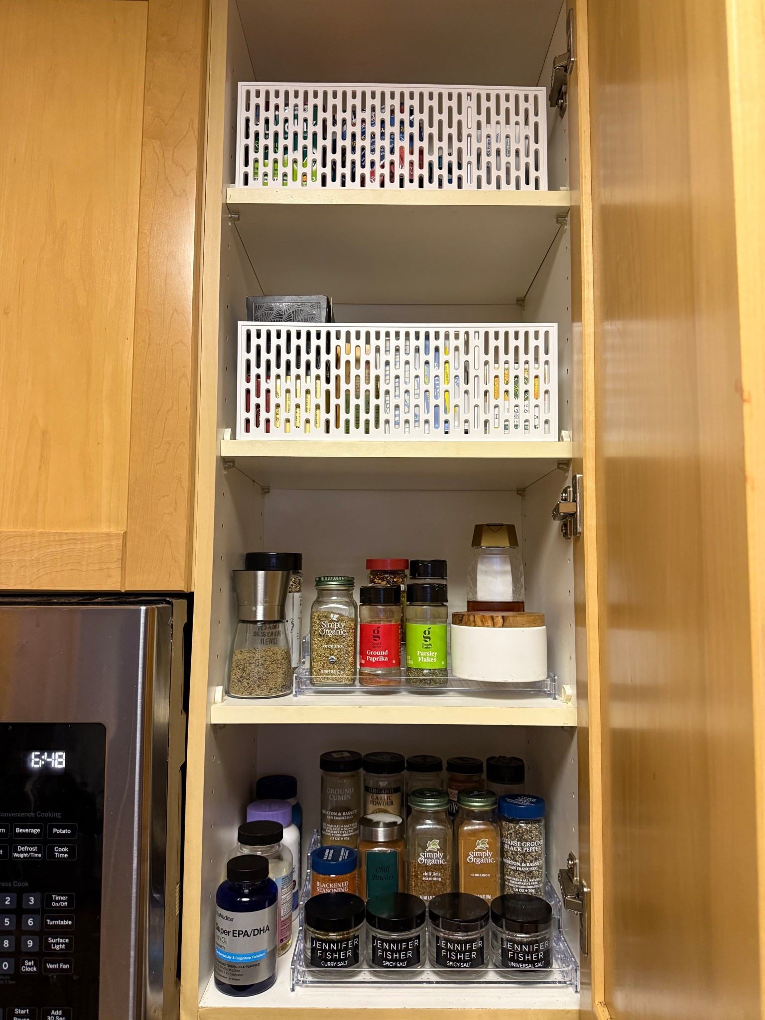 Medicine, tea, and spice cabinet looking so good

#LTKHome