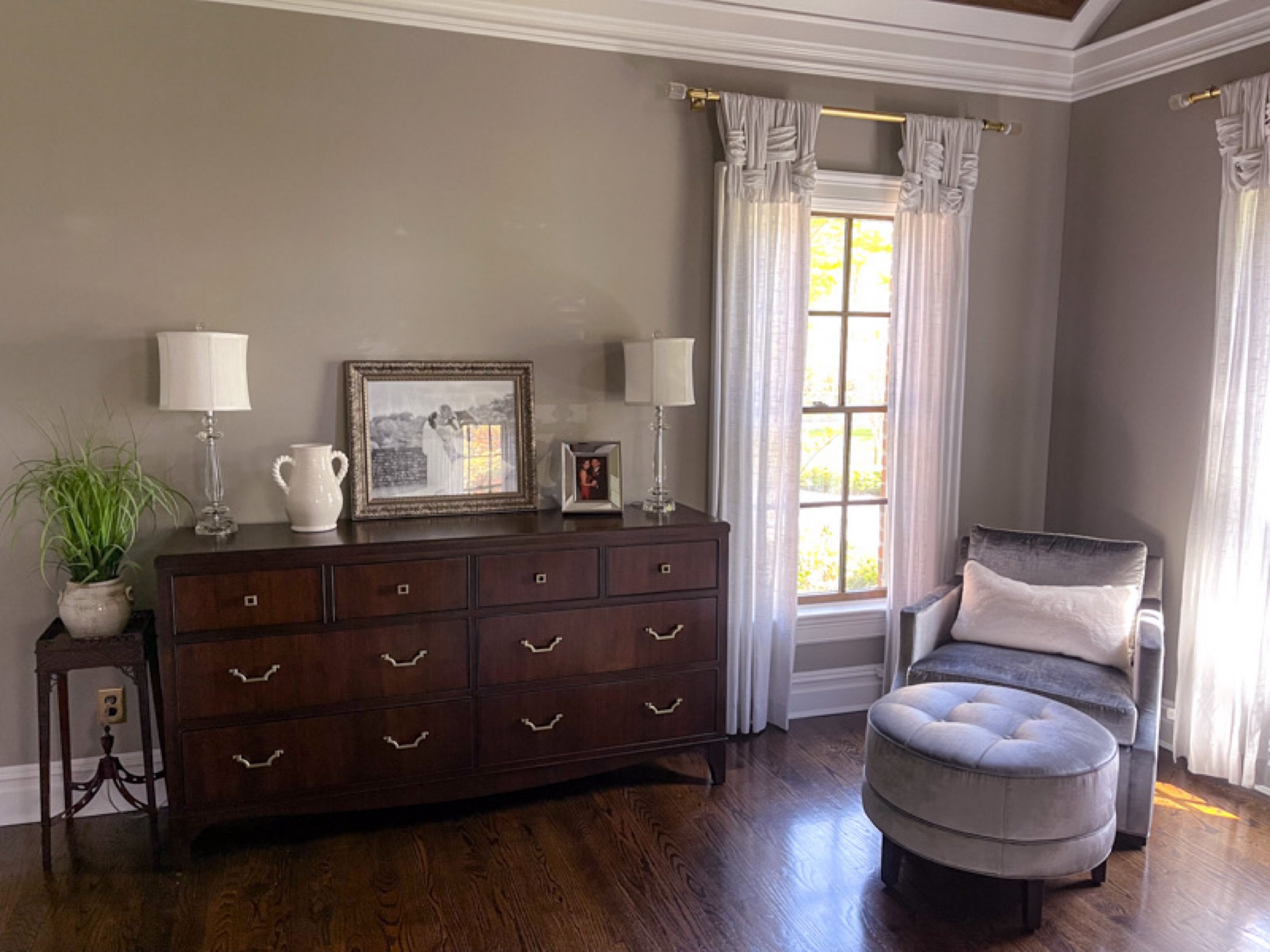 Recreating my master bedroom by linking similar items that are available. Master bedroom, bedroom reveal, modern bedroom, corner bedroom, silver velvet chair, velvet ottoman, brown wooden dresser

#LTKhome