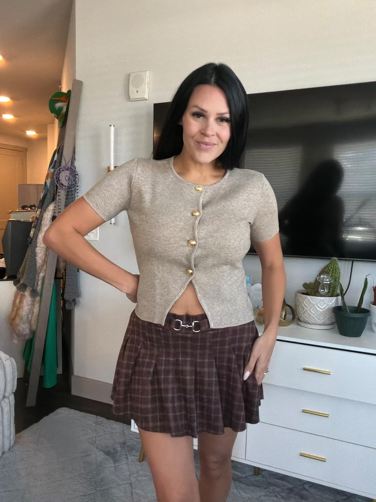 Beige knit & plaid mini. Shop this outfit! #plaidskirt #preppyaesthetic #ltkstyletip 

 #LTKdayinmylife #LTKootd #LTKSaleAlert