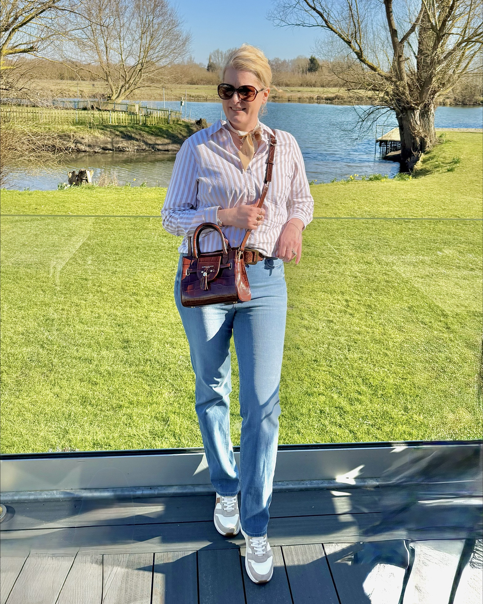 Hi everyone! I love timeless fashion which never goes out of style. One of my wardrobe staples is an Oxford shirt. I found this stripe cotton shirt in beige taupe &amp; white stripes which will go with so much in my wardrobe. Looks great with my blue magic shaping straight leg jeans which really pull you in &amp; so flattering. Such a classic spring look. 
.
M&amp;S, Marks &amp; Spencer, over 40, U.K. fashion, affordable, casual, tall, midsize, smart, chic, size 14/16. 



#LTKspring #LTKuk #LTKstyletip