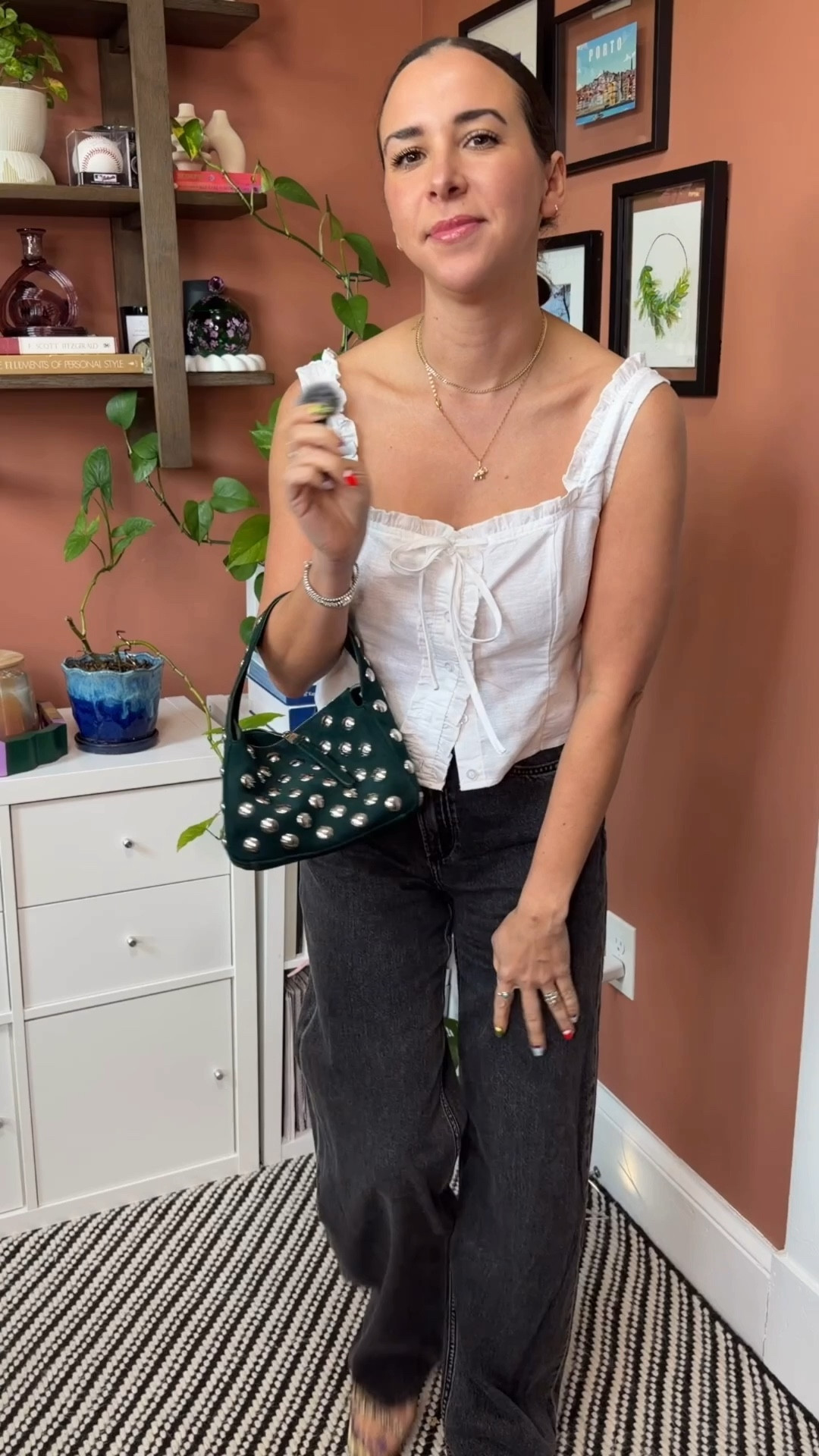 The deal of a century with my Khaite bag find! Wearing a cute white tank from @Revolve paired with relaxed denim.

Spring outfit. Summer outfit. Going out. White top. Studded bag. 

#LTKstorytime #LTKootd #LTKSaleAlert