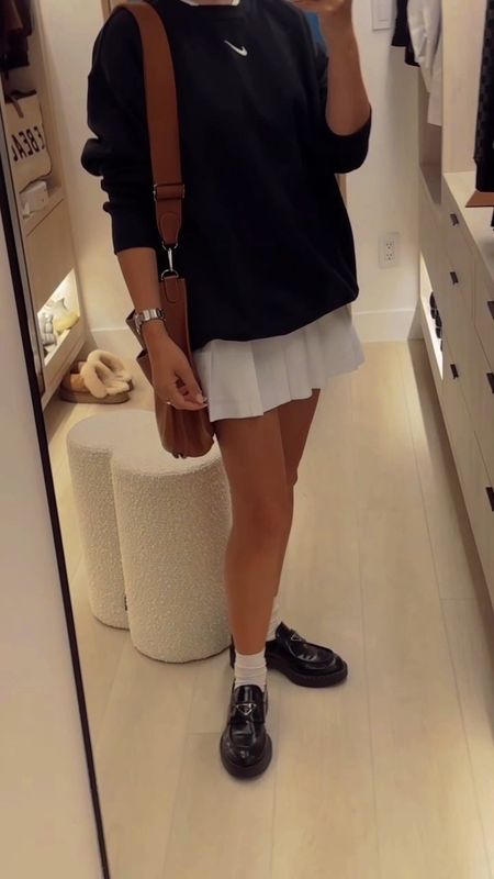 Casual but chic 🤍🖤 Nike sweatshirt is super oversized so I did size small, I could do xs as well but I love this look! Skirt is true to size! 

#LTKSeasonal #LTKVideo #LTKstyletip