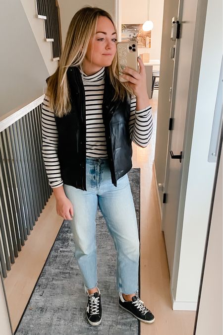 Faux leather puffer vest - under $50! Wearing a medium.
Striped tissue turtleneck - TTS.
Straight leg 90s jeans. - TTS
Golden goose sneakers. - Normally a 8.5 and I take a 39 in Superstars.

#LTKunder50 #LTKstyletip #LTKSeasonal
