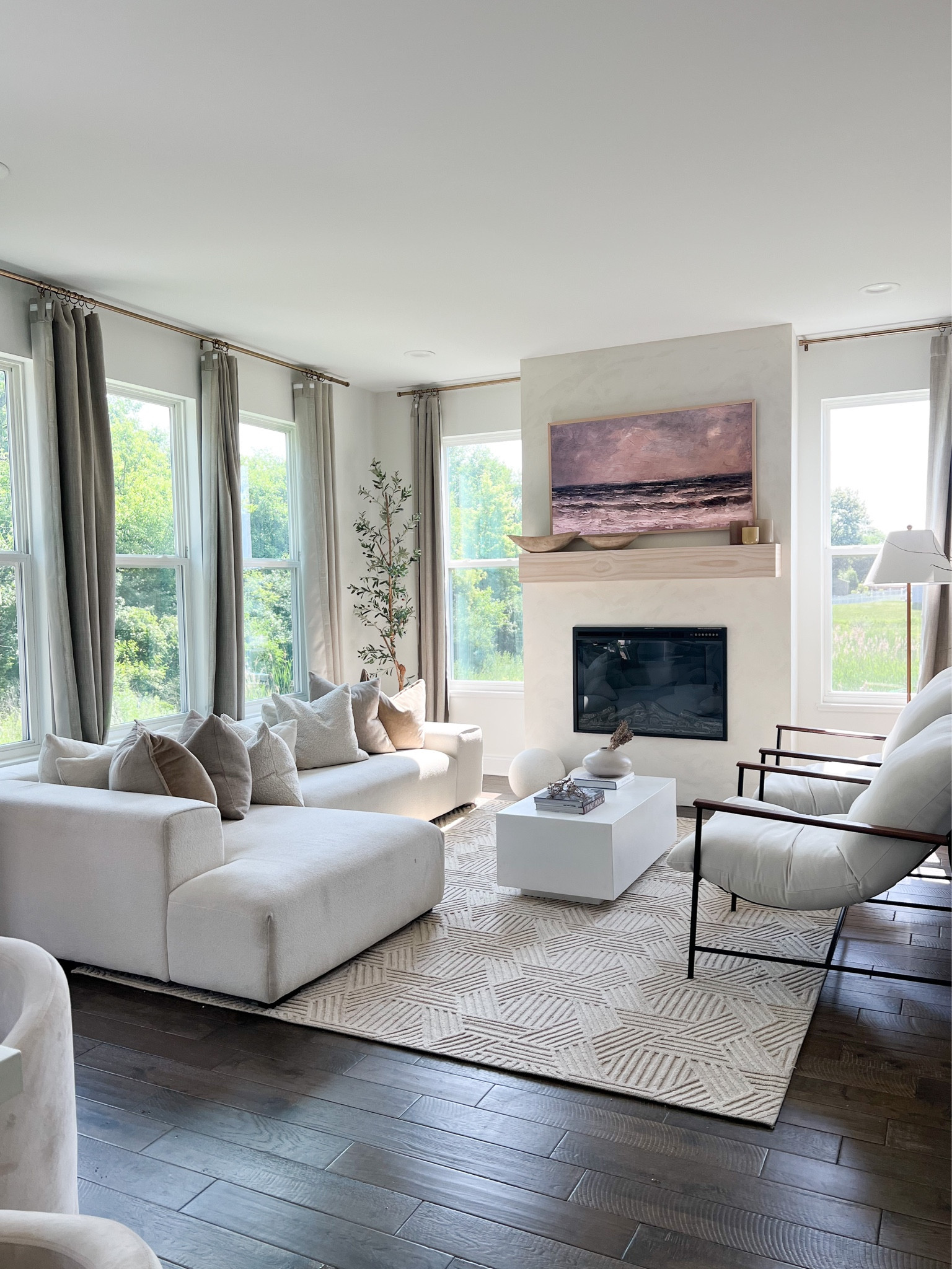 warm modern decor, living room decor, white sectional 

#LTKhome #LTKFind