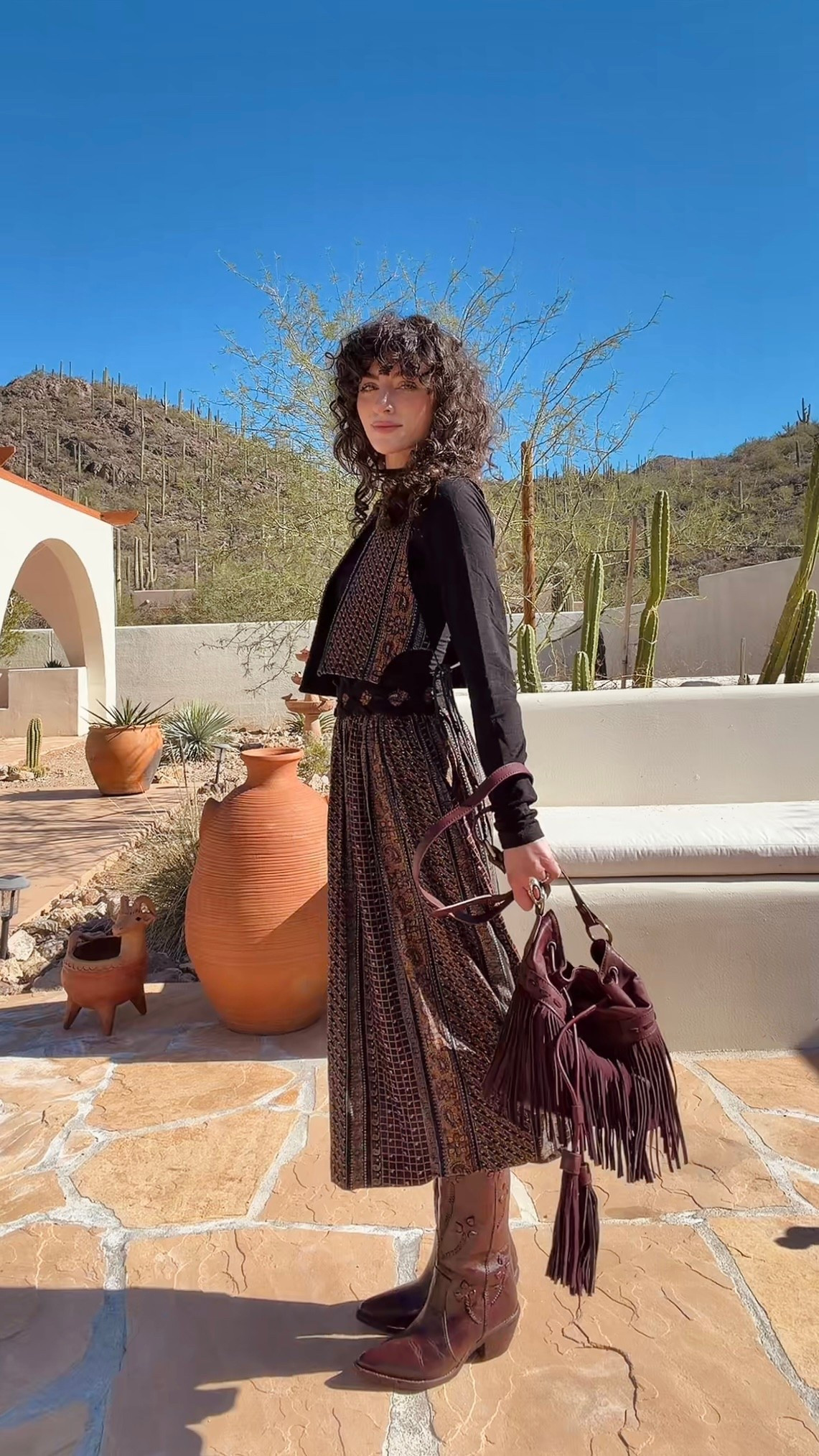 The leather on these cowgirl boots and fringe bag is incredible! 
