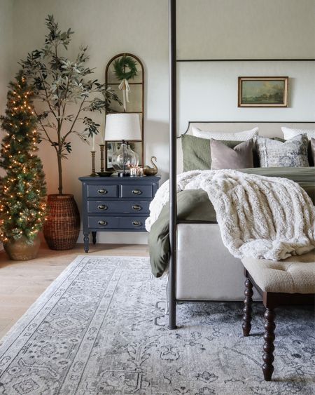 Our holiday bedroom!

Wayfair canopy bed, neutral Persian rug, black nightstand, arch wall mirror, faux olive tree, pre-lot Christmas tree, bedside lamp, faux fur throw blanket, duvet cover, velvet pillows

#LTKHoliday #LTKsalealert #LTKhome