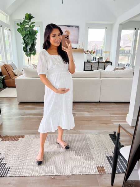 Little white dress for spring dresses on sale for 50% off! Wearing size small petite to make it maternity friendly. Love how it’s so comfortable and could be nursing friendly. Dress up for business casual with a blazer or cardigan  

#LTKsalealert #LTKbump