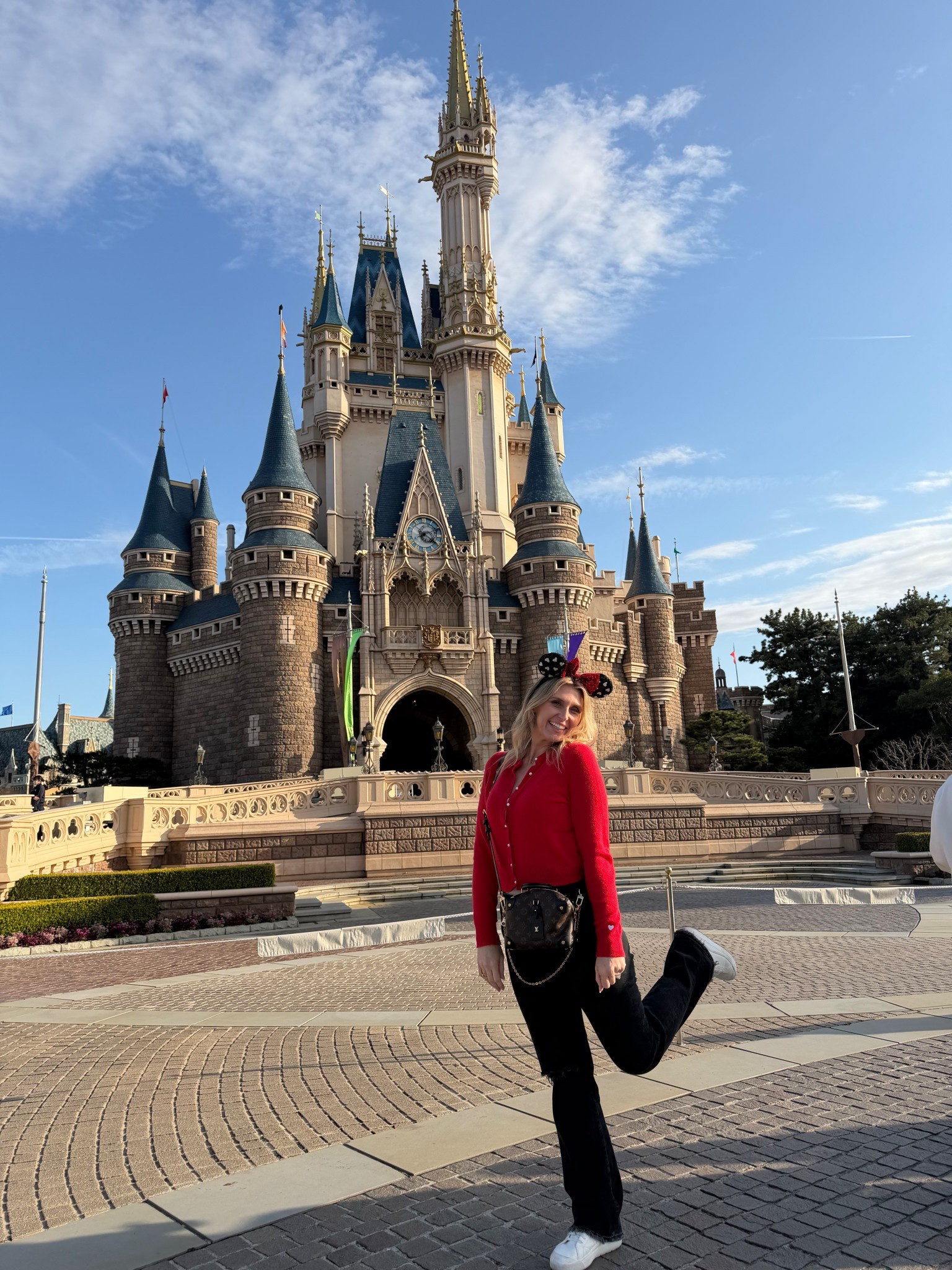 Minnie Mouse theme outfit for Tokyo Disneyland! Black denim and red cardigan with exclusive ears! 

#LTKTravel #LTKxAerie #LTKootd