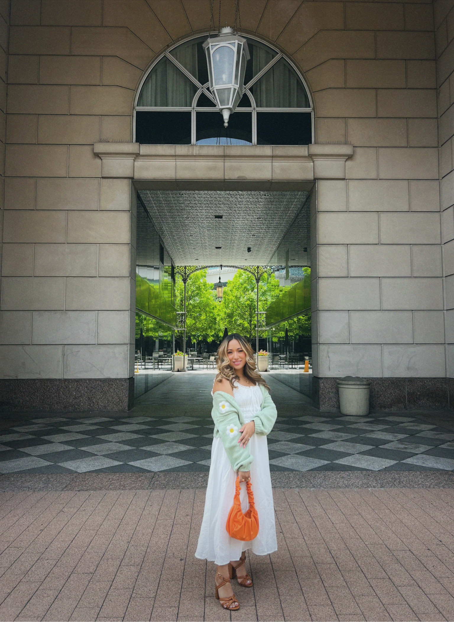 Spring outfit. Beautiful cozy white dress with mint green floral sweater. A pop of color with orange bag! Strappy open toe heels ☀️🌼✨ easy breezy apron outfit or summer dress! 

#LTKstyletip #LTKSeasonal #LTKshoecrush