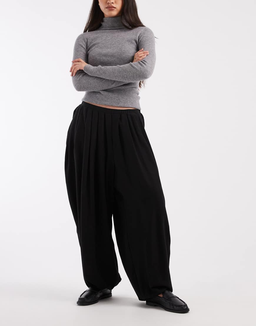 ASOS DESIGN pleated barrel leg pants in black | ASOS (Global)