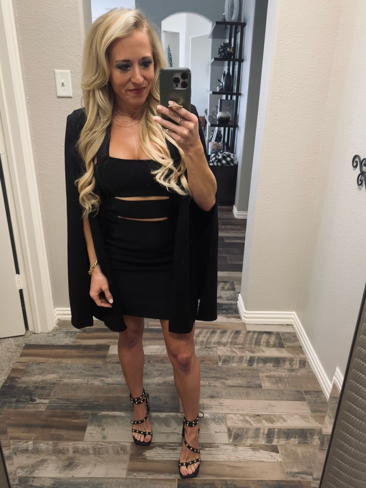 LBD Herve cut out bandage dress (I rented through rent the runway) with black open front cape blazer over it 
Jessica Simpson black studded heels 
At home blow out with Shark flex style 
Self tanner 