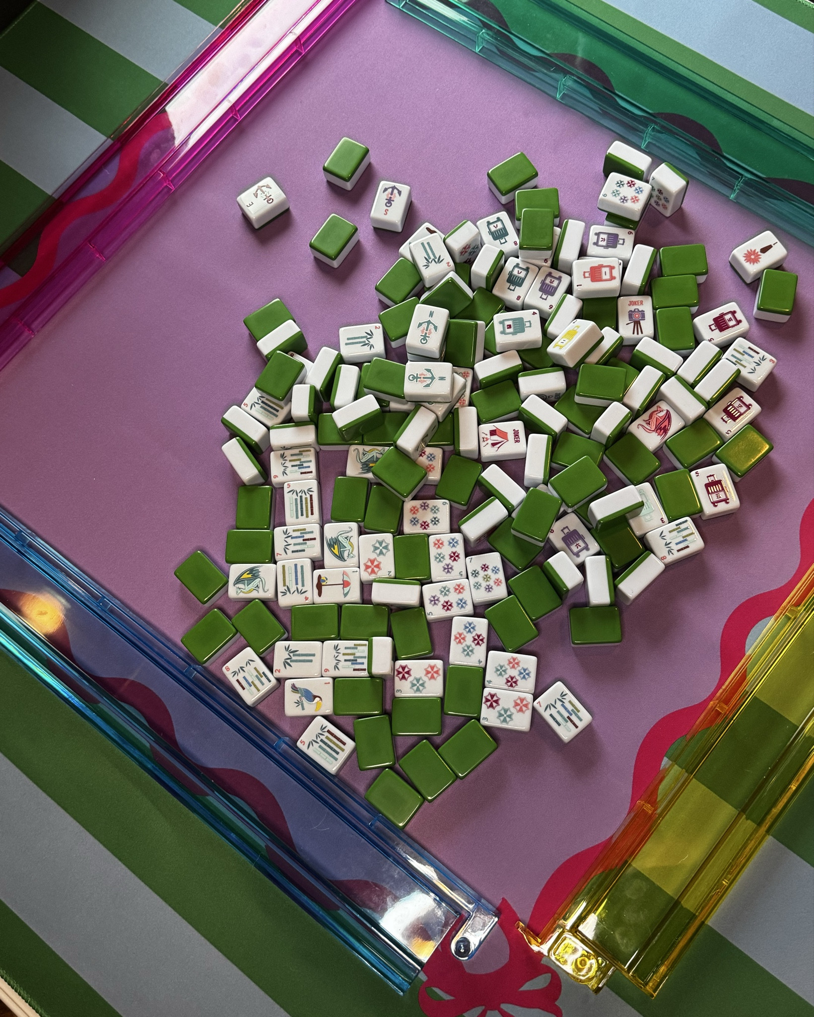 Tiles I have played before!  Sharing this incase someone is looking for a starter set of mahjong tiles. Note: most tiles are not returnable at all. Some brands on Amazon will accept tiles that are still in packaging. Check the return policy. 
Slide 1 - green printed tiles from My Mahjong Trove (a tile manufacturer) on Amazon. Travel themed. I personally don’t like the how the red dragon doesn’t visually coordinate with the Craks. The back is like a Kelly green. I own this as a practice set. It’s is a great price for a themed starter tile set. Comes with its own tile bag and blue dice.
Slide 2- the other printed set from My Mahjong Trove (a tile manufacturer) on Amazon. The colors are more pastel. The back is a light pink. I like the bird bams, and I like the soap isn’t a plain square. I also own as a practice set. Again, a great price for a themed starter tile set. Comes with its own tile bag and pink dice.
3- Paradise set from Mahjong Co. on Amazon (created by Oh My Mahjong) 
I do not own, but I have played. It is colorful and just pops against the dark floral mat. The back of the tiles are orange. The set is gorgeous. I love the bird bam and flowers. 
Slide 4 - A great starter set that is a very pretty clear back with colorful pattern. I do not own, but I have played. It is gorgeous and comes with racks and bag. Note: it has a traditional tile face - some people don’t like the traditional tiles. Looks good with its multi colored racks. And I really like that the tiles come with their own box.
Slide 5- the Kaleidoscope set from Mahjong Co. on Amazon (created by Oh My Mahjong) also a gorgeous set. Bright pink backs. I do not own, but I have played. 
Slide 6- Gemma from Oh My Mahjong.com I do not own, but I have played. Gorgeous set! I love the dark purple! It is a pricey set and can not be returned so make sure you have watched the tile reviews on the Oh My Mahjong instagram and You Tube so you can see what the tiles look like in detail and what racks/mat match the tiles. They also have a custom “build your set” page that you can have fun with!
#mahjong


#LTKGiftGuide #LTKHome