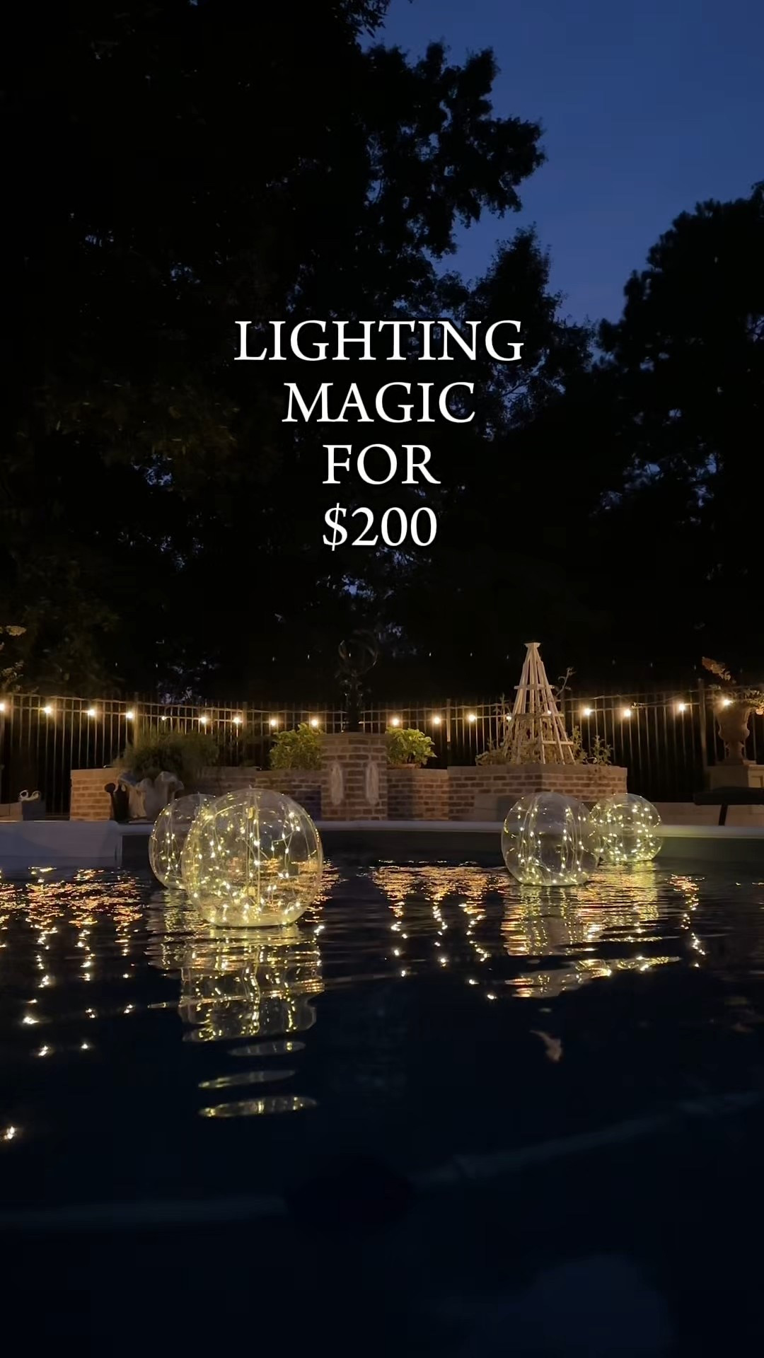 Unfortunately our pool did not come with lights.
.
And the kids always want to swim in the evening.
.
But I don’t like how dark it is out there.
.
So, first of all: lining the entire pool fence with Edison bulb string lights is breathtaking.
.
And then, of course, the blow up fairy light balls (sooooo pretty at night!).
.
The last piece (and these line our deck, paths, and driveway), are solar dock lights that you can run over with your car.  We have these all over our property lighting paths.
.
It’s such a complete upgrade!