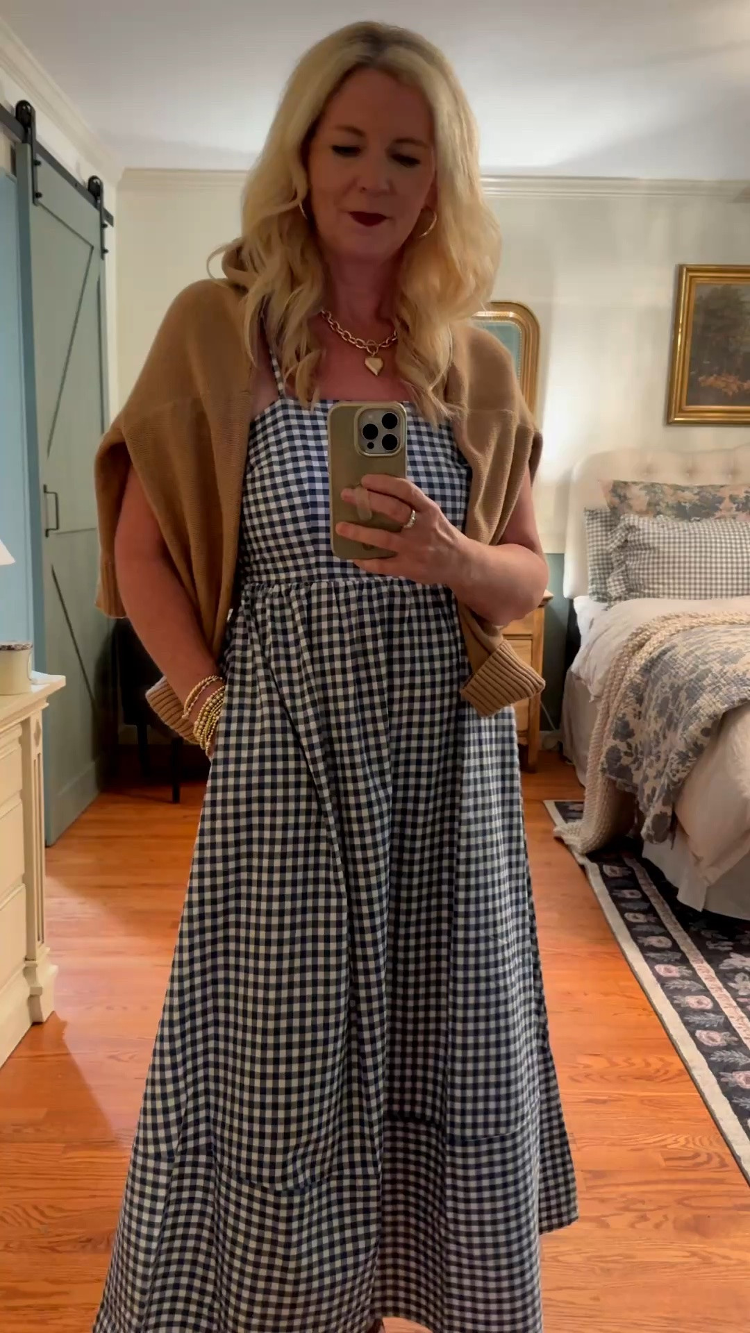 I knew I’d love this dress and it did not disappoint. Give me all the gingham. Navy blue gingham sundress, organic cotton cropped cardigan, camel cardigan, dressy women’s sandal, cushioned sandals, brown sandals, gold heart necklace, gold chunky chain necklace with heart, gold beaded bracelets, bracelet stack, women’s classic and comfy summer outfit.

#LTKootd #LTKOver40 #LTKSaleAlert