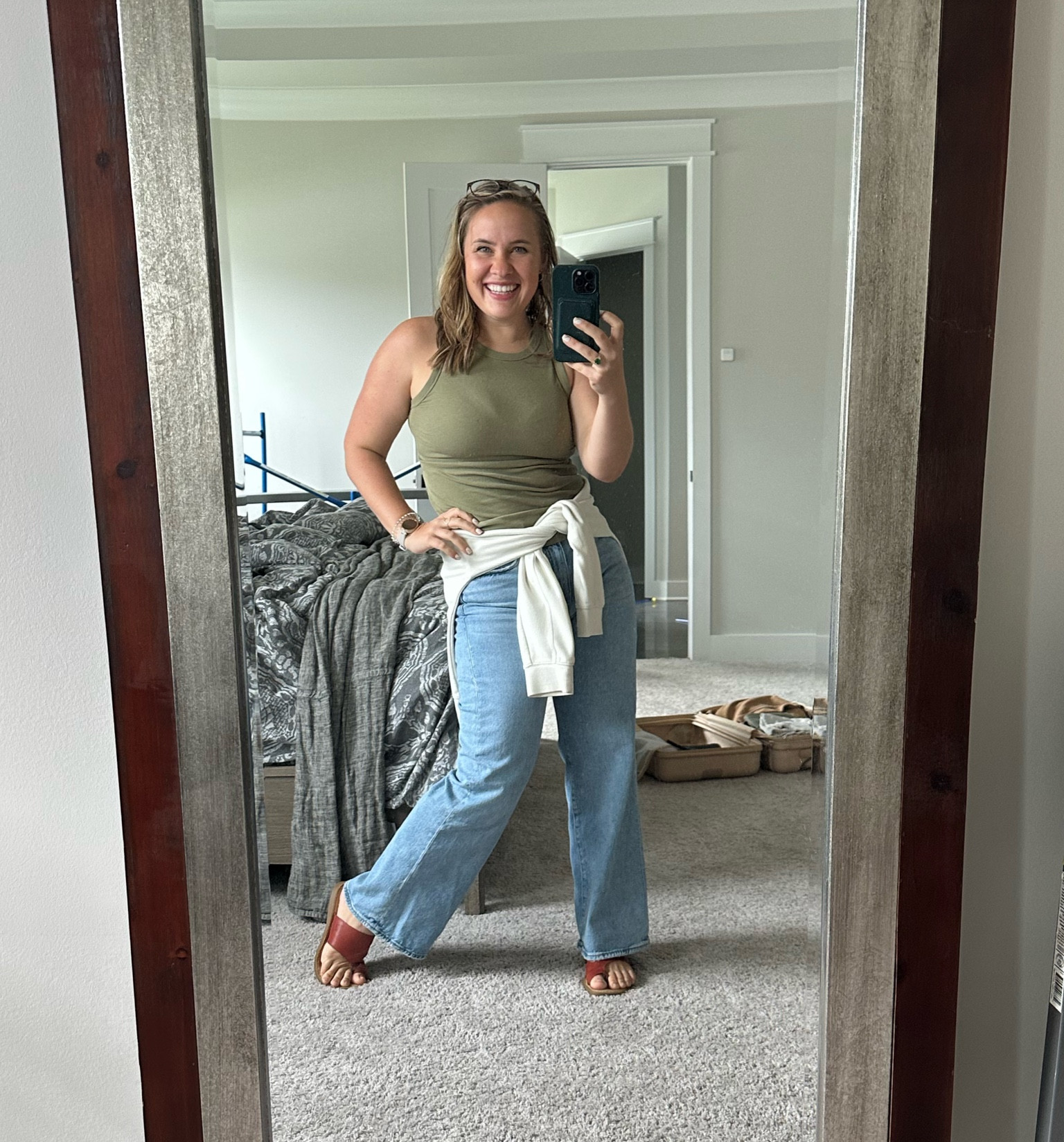 Airport ready! Obsessed with these jeans and they are on sale! The pull over around my waist is cozy!!!!

#LTKfindsunder50 #LTKsalealert #LTKfindsunder100