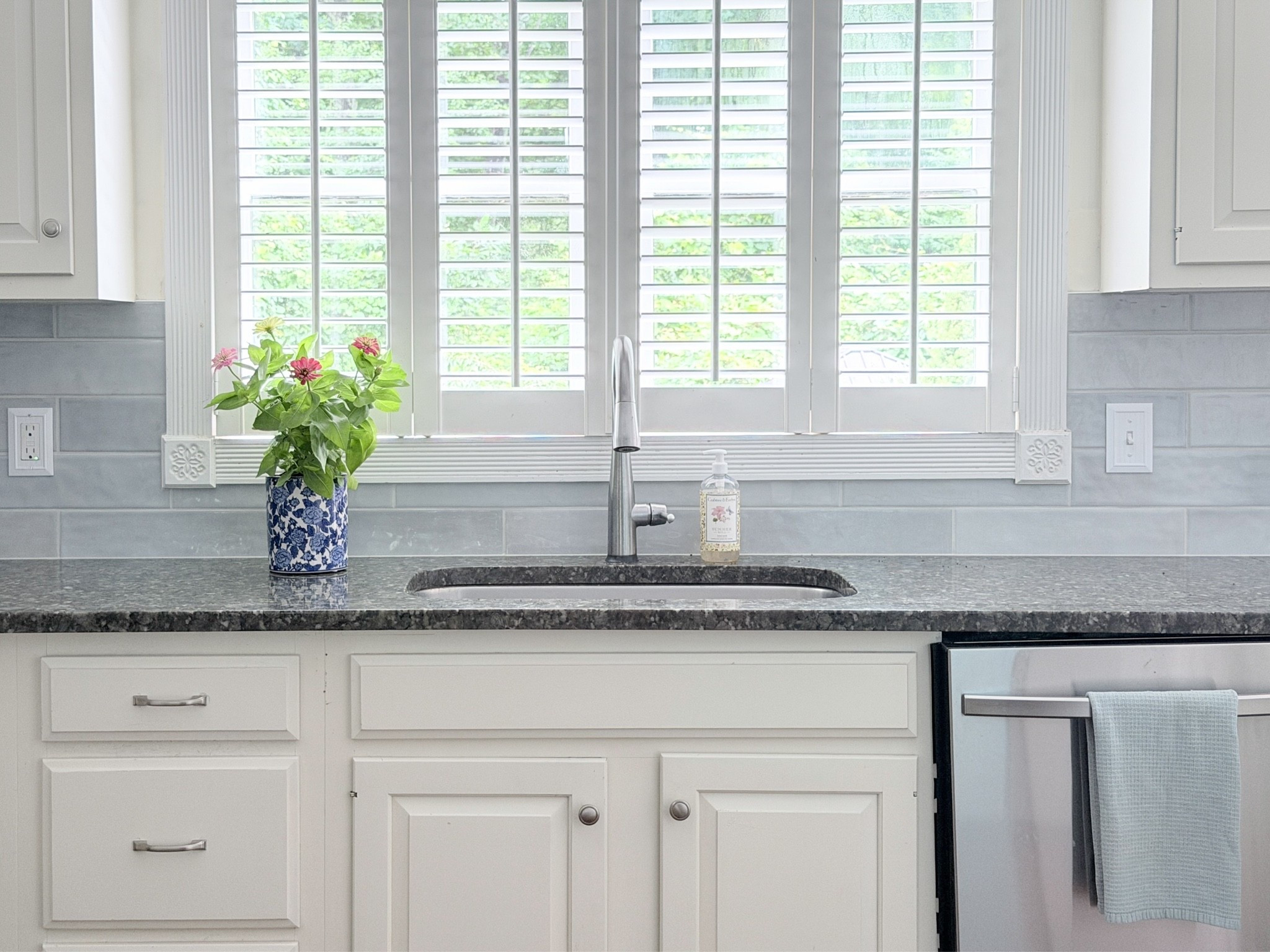 New kitchen backsplash and grout for the dreamiest blue and white kitchen with oversized tiles & updated nickel hardware

#LTKHome