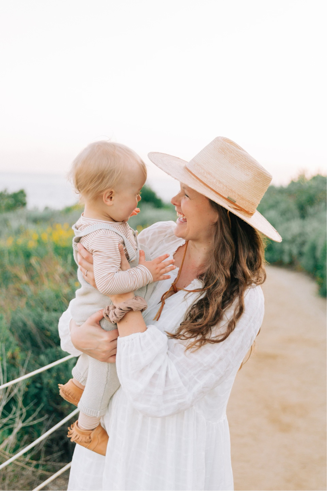 My favorite summer hat from Gigi Pip. It looks good on everyone! 
This Free People dress is from a few seasons ago, but I tried to link some similar styles! 