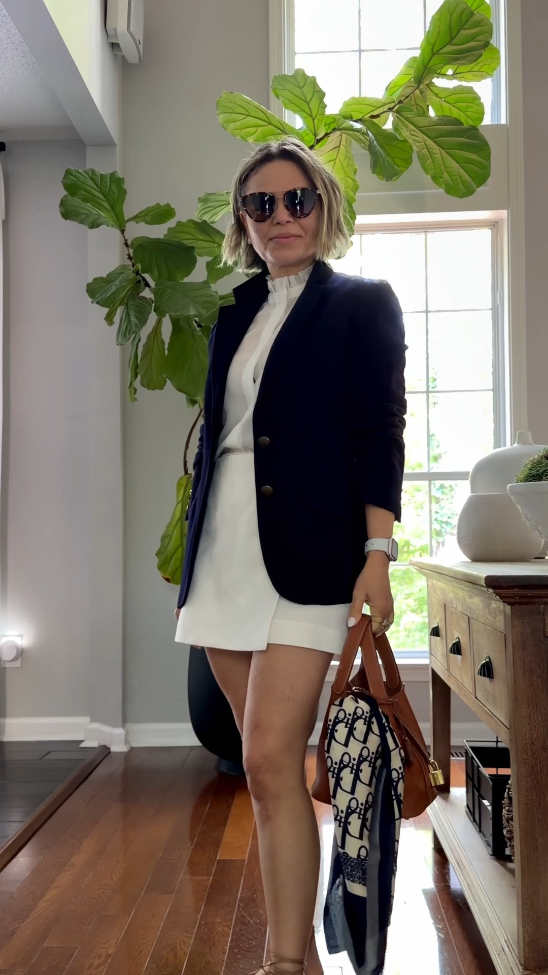 work outfits
Cream blouse and skort paired with navy blue blazer, camel bag and sandals added a scarf for a fun accessory and off course sunnies! 

#workwear #officeatire #summer #skort #outfit

#LTKSeasonal #LTKOver40 #LTKPetite