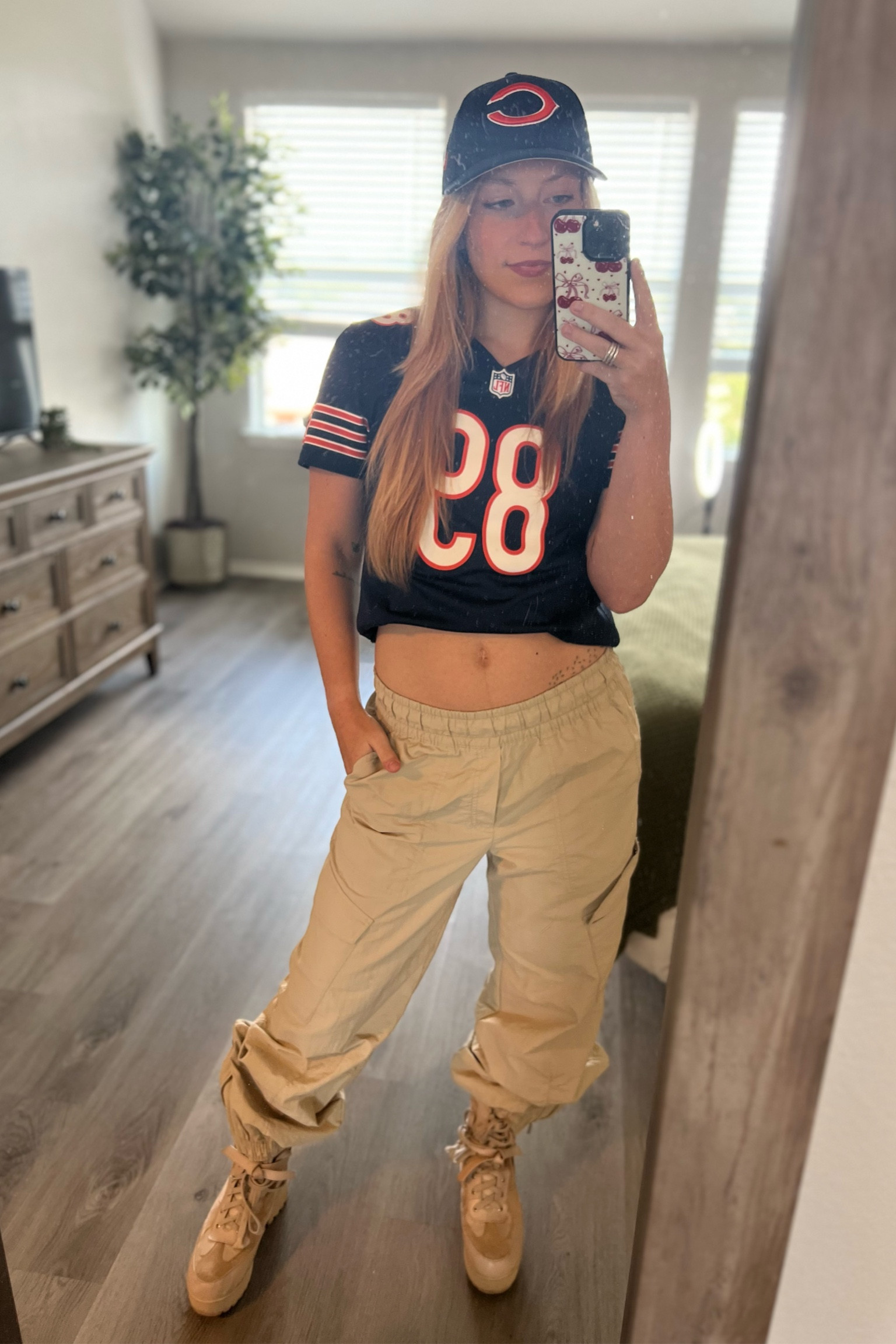 Game day outfit - football outfit - ootd - sporty outfit - old navy pants - joggers - combat boots - bears jersey - nfl jersey - fitted hat - baseball cap - fall outfit 

#LTKStyleTip #LTKFallSale #LTKShoeCrush