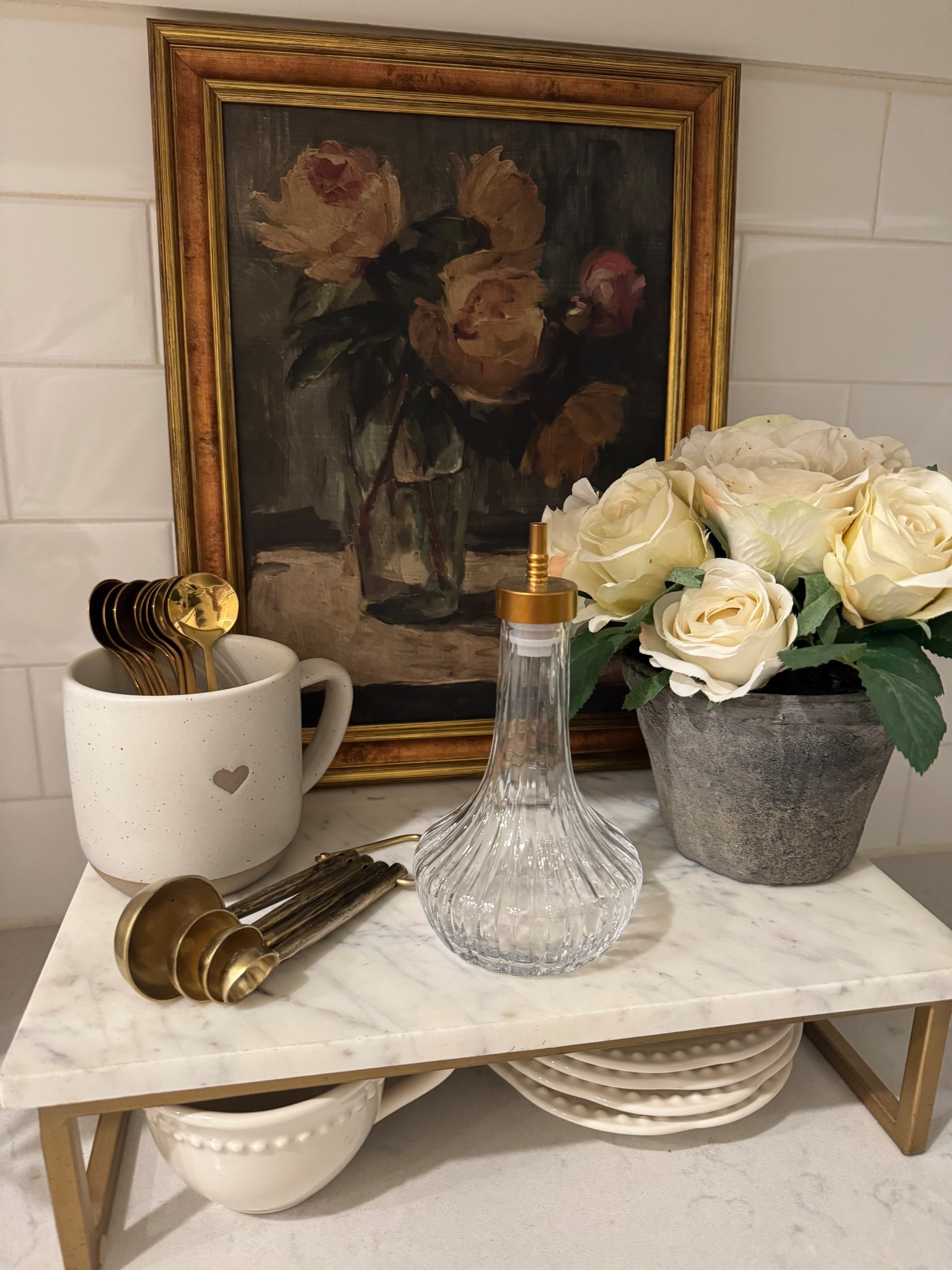 I love switching up the decor on this marble stand from @target. Studio McGee and Hearth and Hand pieces never disappoint including this art piece and heart mug. The glass dispenser also gives a vintage touch. #targetfinds #studiomcgee #hearthandhand 

#LTKValentine #LTKSeasonal #LTKHome