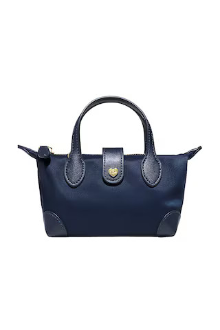 Stoney Clover Lane Pouchette Crossbody Bag in Sapphire from Revolve.com | Revolve Clothing (Global)