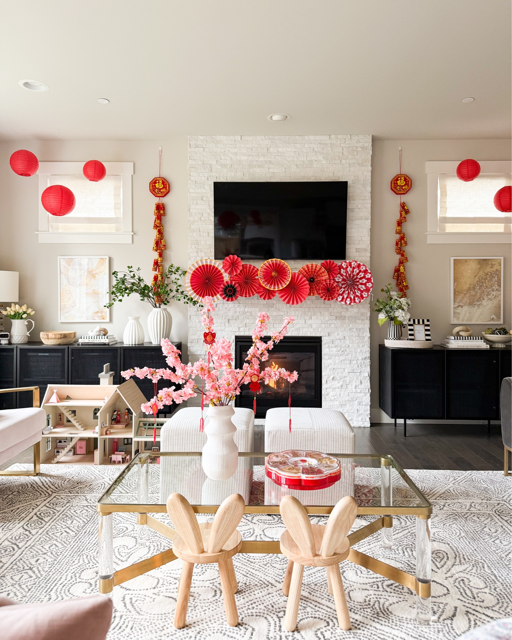 Lunar New Year decor with red paper lanterns! Living room 

Chinese lunar new year, Vietnamese Lunar New Year Decorations 2025, Tết, Artificial Flowers, Hanging Ornaments, Chinese Red Lanterns Oriental Hanging Lucky Paper Fans, red envelopes, rug, vase, cabinet credenza, double sided tape, command clips, home decor, frame, year of the snake

#LTKWatchNow #LTKSeasonal #LTKHome