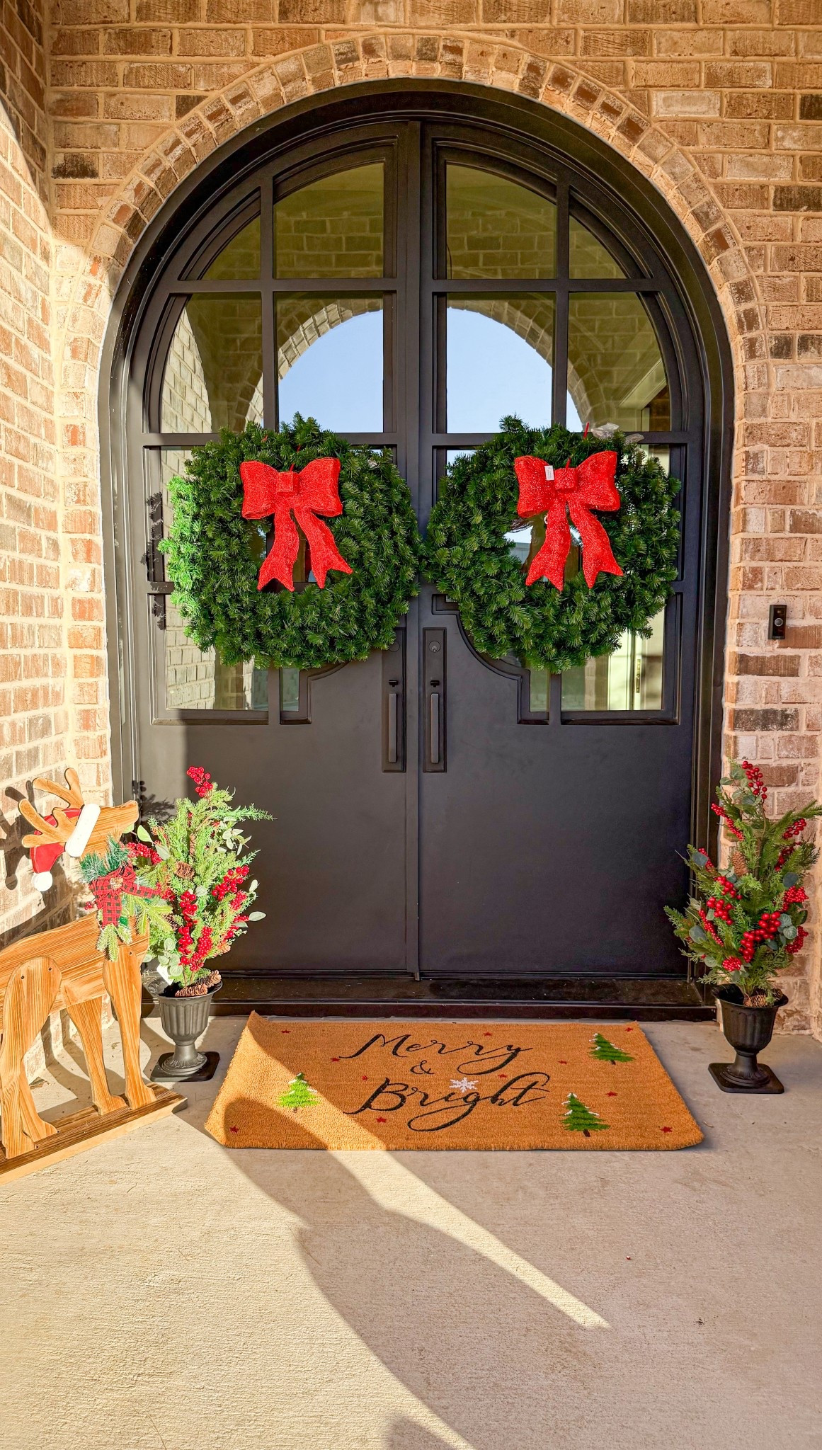 @wayfair #ad #wayfairpartner #wayfair

Our entryway got a Wayfair Christmas glow-up! Every piece feels timeless and cozy — proof you don’t need to go overboard to make a big impact.

Lisdale Chunky Wooden Christmas Reindeer (30” H) — this little guy is the star of the porch. The natural wood grain gives a rustic charm that pairs beautifully with warm lights.
36” H Lighted Pine Porch Trees (Set of 2) — pre-lit and accented with faux berries + pinecones. I placed them in black urns by the door — the height is perfect for framing your entry.
Bisou 76” Artificial Cypress & Pine Garland (Set of 2) — draped along the door frame to tie everything together. Full, flexible, and mess-free.

✨ Everything is from @wayfair — high-quality, realistic, and shipped fast. Linking all products + exact sizes on LTK!