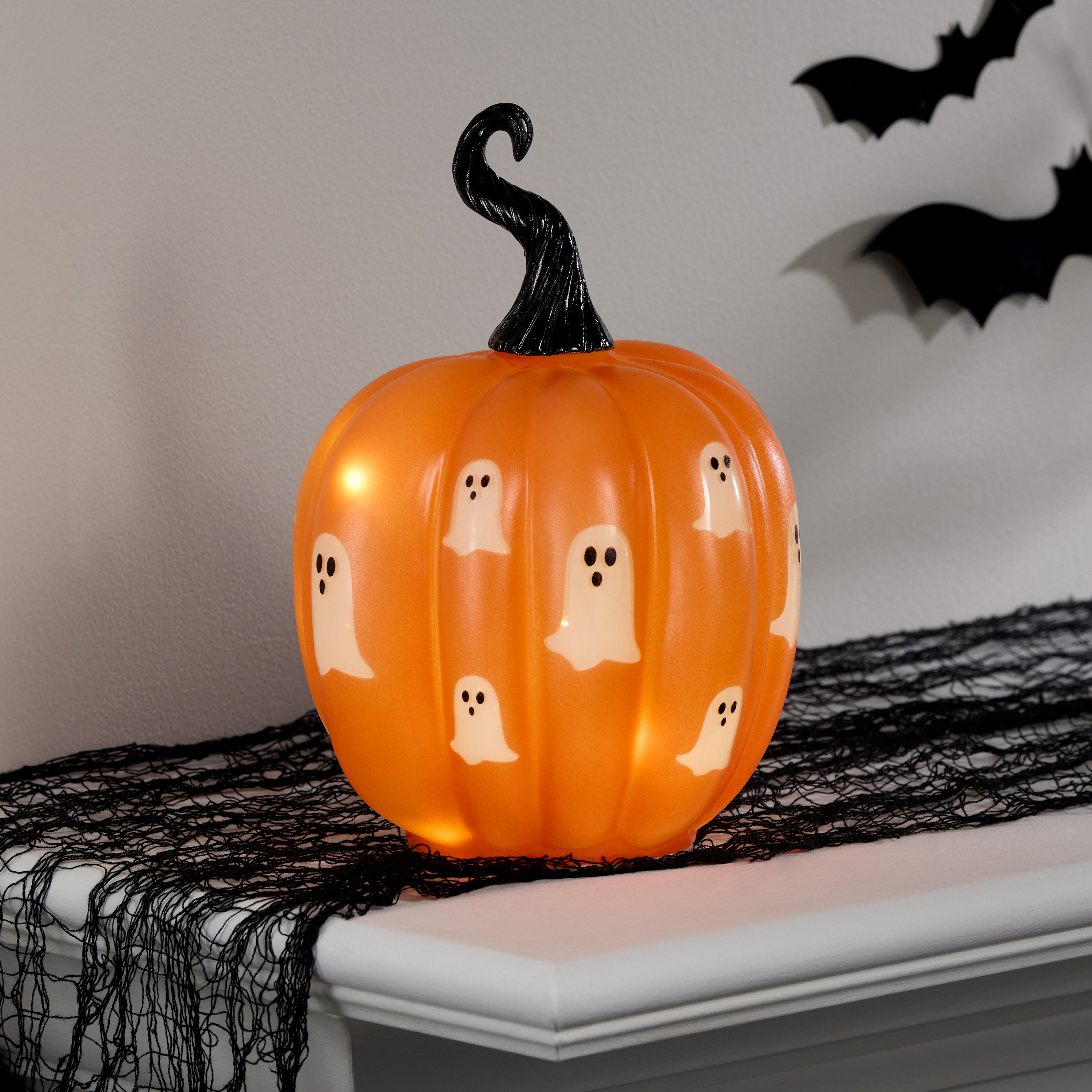 Matte Orange Glass Ghost Pumpkin LED Light Up Decor with Timer | World Market