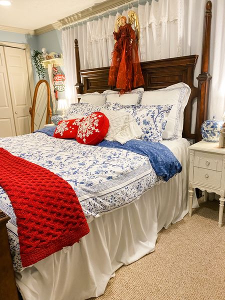 The Laura Ashley Home Comforter Set (mine is the duvet style) in Charlotte Blue has been a game-changer for my bedroom. The 100% cotton construction feels luxurious, and its medium weight makes it ideal for year-round use. I love the reversible feature, giving me two stylish looks in one. The dimensions are just right for my king-sized bed. Overall, a fantastic addition to my home decor!

The antique nightstands are 95% like mine. The custom pair of nightstands priced at $3100.00 offers a unique blend of antique charm and personalized style. Crafted from re-purposed wood and transformed from antique and vintage pieces, these bedside tables promise character and history. The dimensions, averaging around 30" H x 13" W x 19" D, can be tailored to your specific needs. The prospect of having them refinished and hand-painted in the color of your choice adds a bespoke touch. While the 8-10 week shipping timeline might require patience, the end result is a one-of-a-kind addition to your space.

Transformed my dresser with the IOD Midnight Garden furniture transfer, and it's stunning! Vibrant flowers and charcoal outlines add elegance. Applied effortlessly, perfect with Fusion Mineral Paint. Followed the steps, and the result is a masterpiece! The 24" x 33" image is a game-changer.

The rest of the items linked are very similar to what I’m using in this Christmas bedroom. 

#LTKHoliday #LTKstyletip #LTKhome