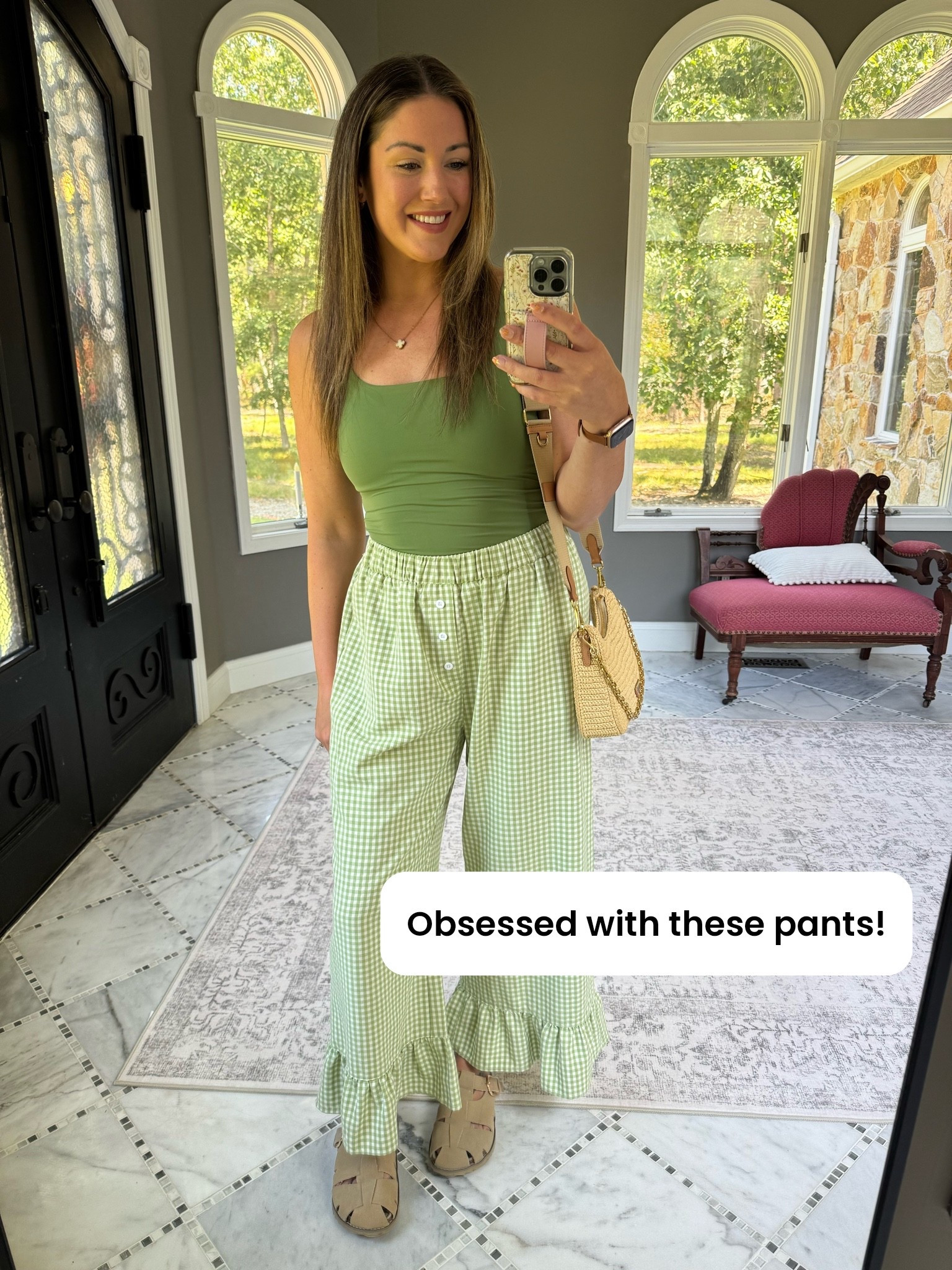 Early fall dressing when you’re not quite ready to give up the lighter pieces 🤎🌿

Gingham linen pants with the sweetest ruffle hem + a double-lined green tank, finished with woven leather clogs. Easy, comfortable, and still feels put together.

gingham linen pants, ruffle hem pants, green tank top outfit, woven leather clogs, early fall outfit, transitional weather outfit, women’s casual fall outfit, elevated casual outfit, linen pants outfit, gingham pants outfit, fall fashion 2026, fall outfits, fall outfit ideas, end of summer outfit, early fall outfit, casual outfit ideas

#LTKSeasonal #LTKootd #LTKmomlife