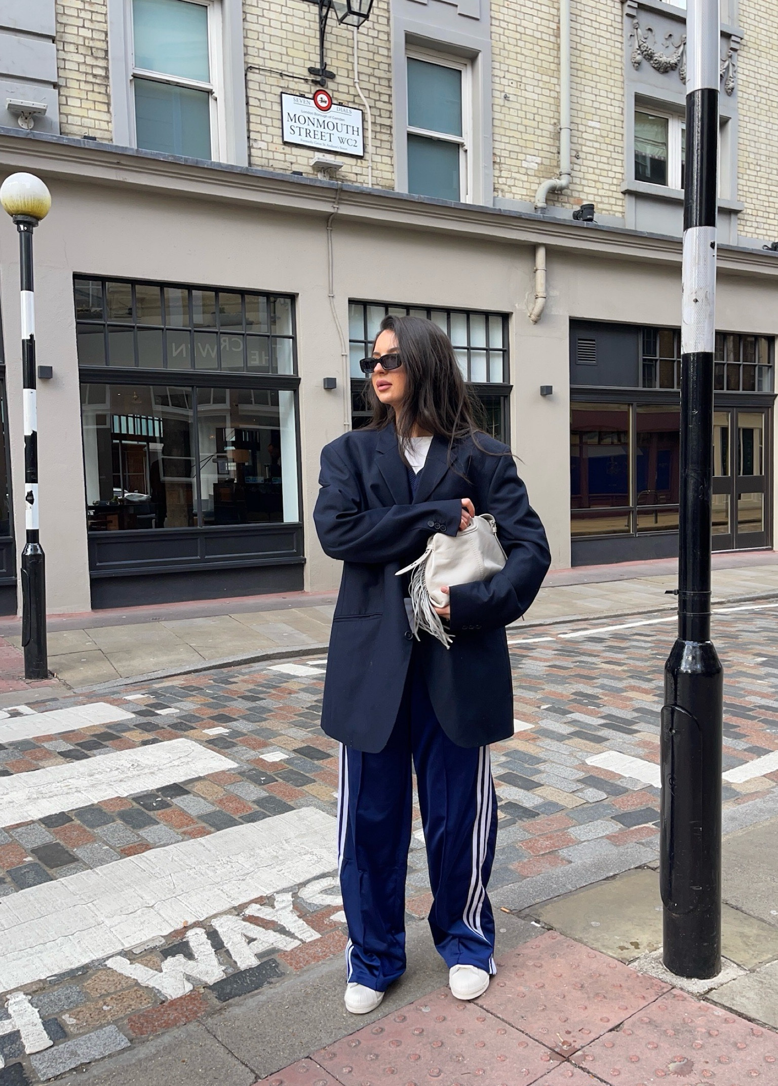 Adidas, Na-kd, Asos, Uniqlo, Maje, Weekday, Stradivarius, Gucci, transitional outfit, transitional style, spring outfit, spring fashion, navy blue tracksuit, wide leg tracksuit pants, sweater vest, navy blue vest, oversized blazer, vintage blazer, white tee, white leather bag, Gucci eyewear, Adidas originals, Adidas superstars, athleisure outfit, spring outfit ideas, style inspiration 

#LTKeurope #LTKSeasonal #LTKstyletip