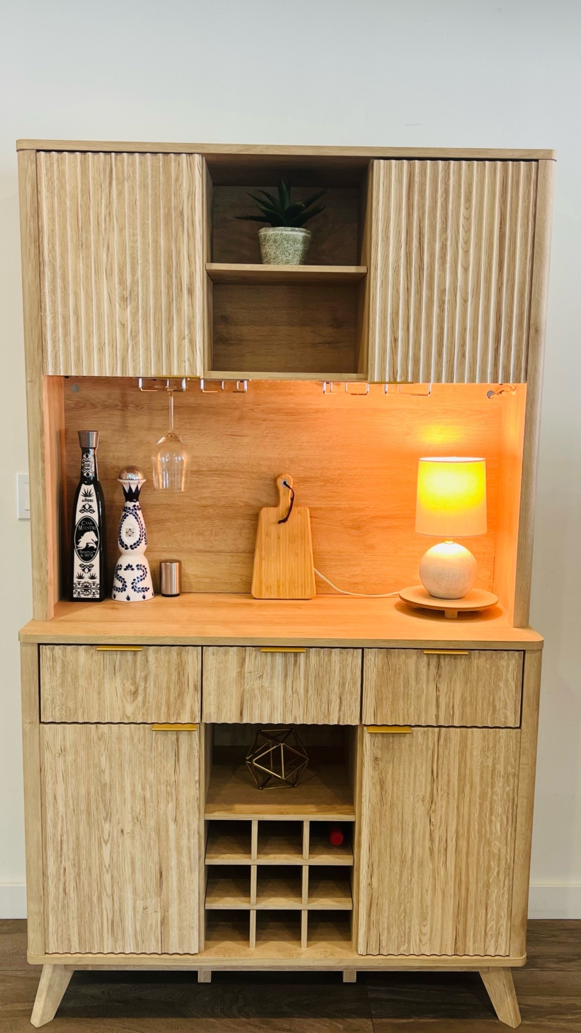 Modern bar cabinet with built-in storage and wine rack 🤍 Perfect for dining rooms, kitchen corners, or hosting nights at home. Loving the warm wood tone and functional design, from @Wayfair 


#LTKmomlife #LTKHome #LTKdayinmylife