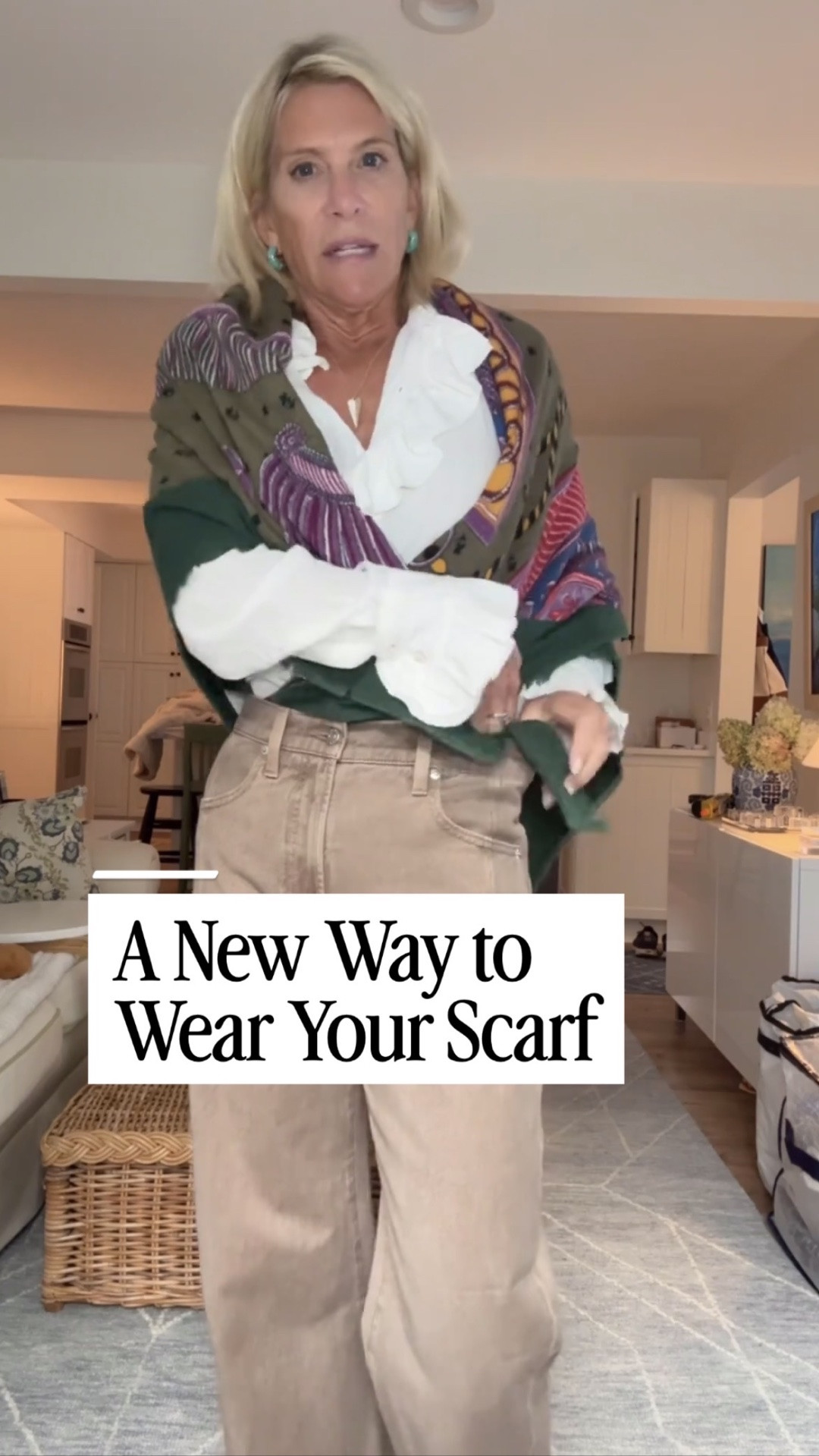 I just made up this scarf trick! Since I’m always cold, I crossed this beautiful patterned scarf over my shoulders instead of wrapping it around my neck. It adds warmth without bulk and makes this white ruffle blouse + neutral pants outfit feel so fallish and pulled together. 🍂

👩‍💻 LTK PRO TIPS
❤️ Heart = Support my posts ;-)
🔖 Save = Get sale & restock alerts for the things you love!
📋 Lists = Keep favorites organized (List ideas: Christmas, Birthdays, and Vacations!)
📲 Share = Send lists and products to a friend (or your daughters like me).
💬 Comment = Ask me anything, and I’ll answer. ;-)

#LTKootd #LTKSeasonal #LTKOver40