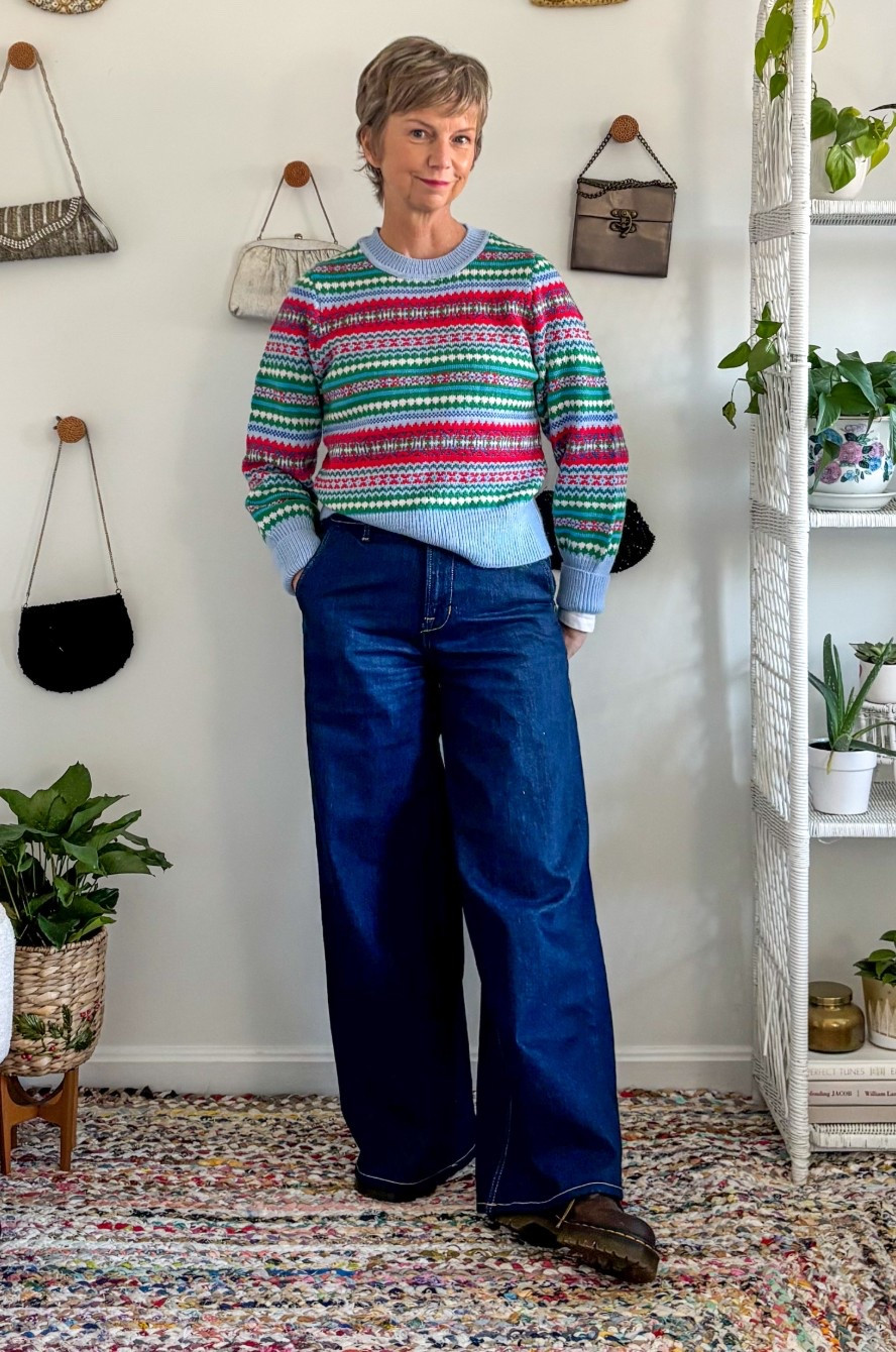 Fun, colorful sweater with wide-leg jeans. 

#LTKOver40 #LTKHoliday #LTKPetite