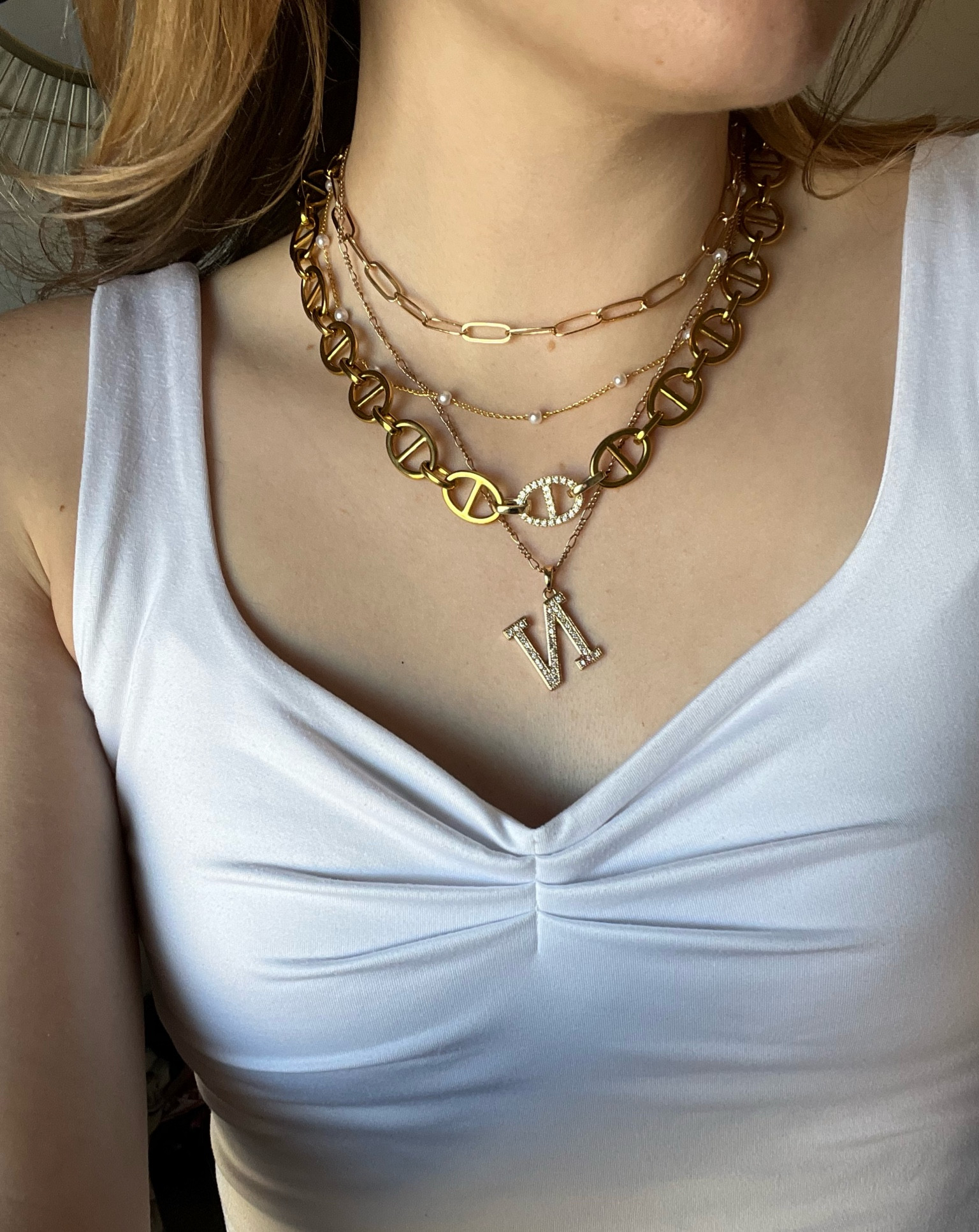 All necklaces are linked! Except gold pearl one is Evry Jewels, called “lover girl” Use my code: NATAL541 at checkout!