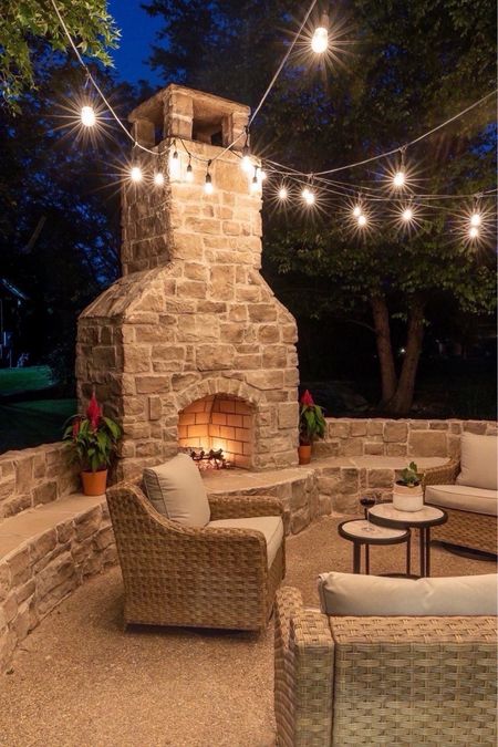 Looking forward to summer nights out on the patio with the fire going ✨ I’ve linked similar rattan chairs, market lights and more. 

Outdoor furniture, outdoor patio, summer nights, simple home decor, outdoor decor, patio decor, fire pit, family nights, s’mores night 

#LTKSeasonal #LTKhome #LTKfamily