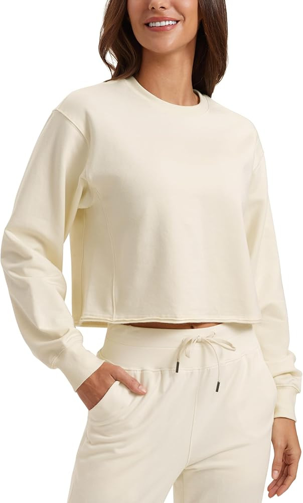 CRZ YOGA Womens Fleece Cropped Sweatshirts Crewneck Long Sleeve Double Raw Hem Workout Casual Pul... | Amazon (US)