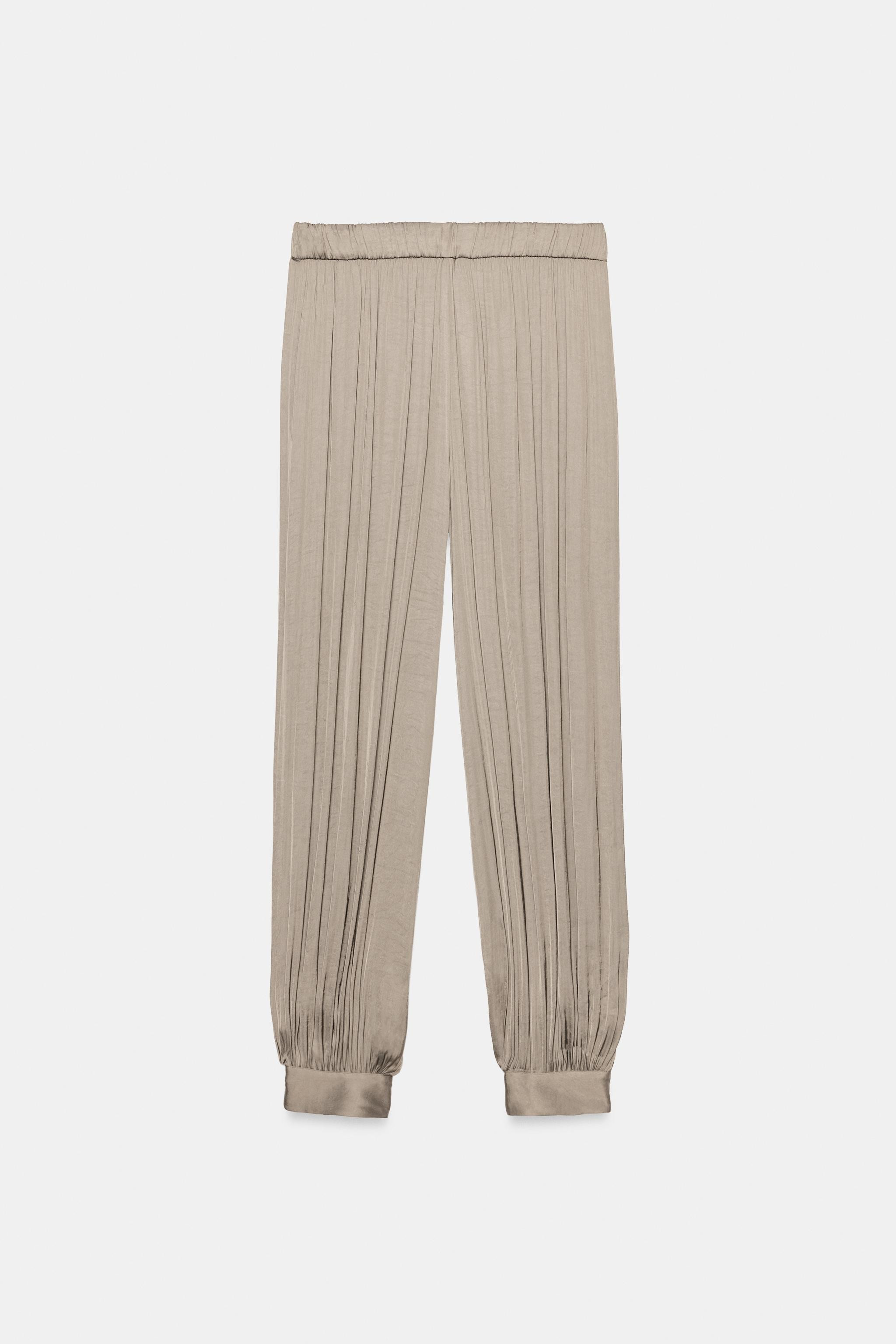 ZARA WOMAN COLLECTIONMid-rise pants with an adjustable elastic waistband with ties. Satin-finish ... | Zara US