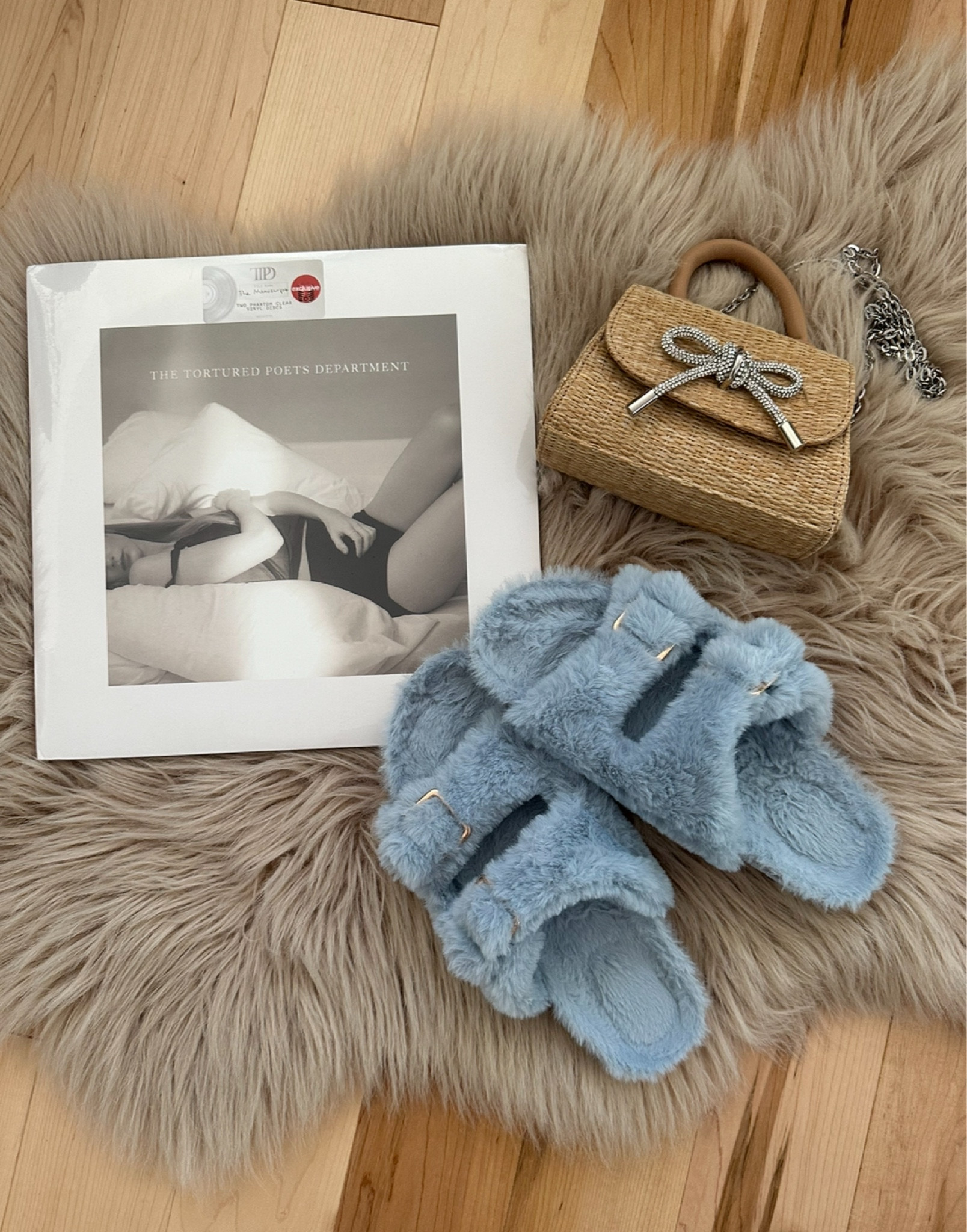 🩵My May top 3 - sharing 3 things I am loving right now that add some magic to my days as a mama of 2 that works from home and loves a little bit of luxury and whimsy in her life! 

🫶linked some dupes below! Sandals and record players on sale today 💖

✨ Looking for some super cozy sandals to wear around your home? 

🏡 I’ve been loving these fuzzy ones for my work from home days, chasing the kids around indoors, and cleaning the house!

🎼 the Taylor Swift TTPD vinyl is amazing! If you don’t have a record player grab one! Mine is linked here- it’s such a vibe 

👜 if you have a wedding coming up, spring or summer travels than this little rattan bow bag is an amazing addition to any outfit! 

✨bonus as a mom it’s so nice to leave the house with a mini purse instead of a giant tote whenever I can! 



#LTKItBag #LTKHome #LTKFindsUnder100