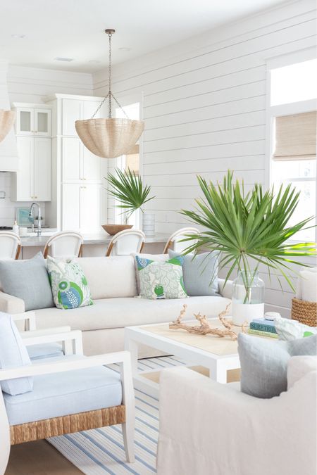 I recently shared a mini tour of our new Florida home! Includes items in our living room and kitchen like our linen sofas, woven back chairs, raffia coffee table, blue and white striped rug, blue and green throw pillows, rope chandeliers, swivel counter stools and so much more! See the full tour here: https://lifeonvirginiastreet.com/a-peek-at-our-new-florida-home/. 

#ltkhome #ltkseasonal #ltksalealert #ltkfindsunder50 #ltkfindsunder100 #ltkstyletip #ltkover40 #ltkfamily 

#LTKhome #LTKsalealert #LTKSeasonal #LTKSeasonal #LTKhome #LTKsalealert