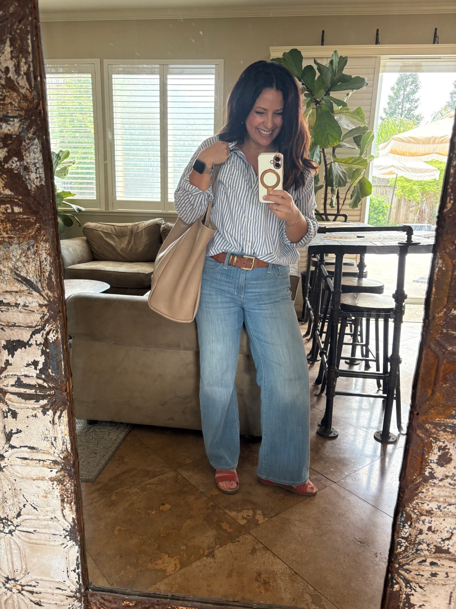 Cotton blue and white strip button down shirt, wide leg light wash jeans, and strappy sandals for an easy spring look. 
Teacher style
Spring Fashion


#LTKPetite #LTKOver40 #LTKTravel